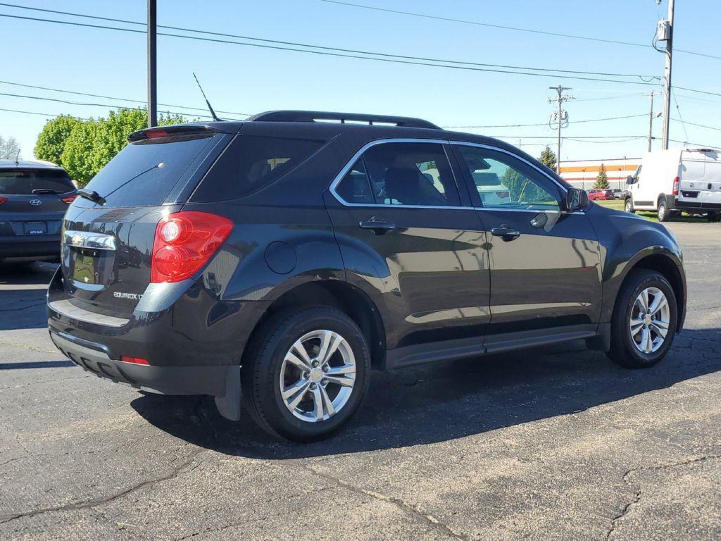 2012 Black Granite Metallic /Jet Black Chevrolet Equinox 1LT AWD (2GNFLEEK9C6) with an 2.4L L4 DOHC 16V engine, 6-Speed Automatic transmission, located at 6064 Gull Rd, Kalamazoo, MI, 49048, (269) 222-0088, 42.328388, -85.512924 - For sale is a well-maintained 2012 Chevrolet Equinox LT w/1LT, a versatile and reliable SUV ready to meet your needs. Equipped with AWD and powered by a fuel-efficient 4-cylinder, 2.4L engine, this vehicle is perfect for both city driving and weekend getaways. The Chevrolet Equinox is designed to ha - Photo#3