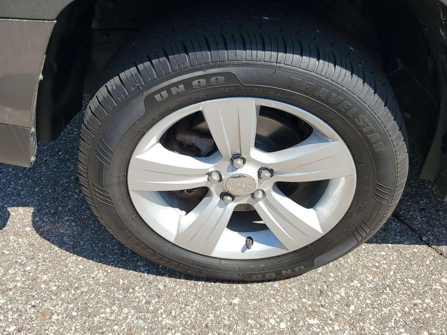 2013 Mineral Gray Metallic Clearcoat /Dark Slate Gray Jeep Patriot Latitude 4WD (1C4NJRFB5DD) with an 2.4L L4 DOHC 16V engine, CVT transmission, located at 234 Columbia Ave, Battle Creek, MI, 49015, (269) 222-0088, 42.298264, -85.192543 - When you encounter slick or muddy roads, you can engage the four wheel drive on this model and drive with confidence. Anti-lock brakes will help you stop in an emergency. The Jeep Patriot has a clean CARFAX vehicle history report. Maintaining a stable interior temperature in this vehicle is easy wit - Photo#4