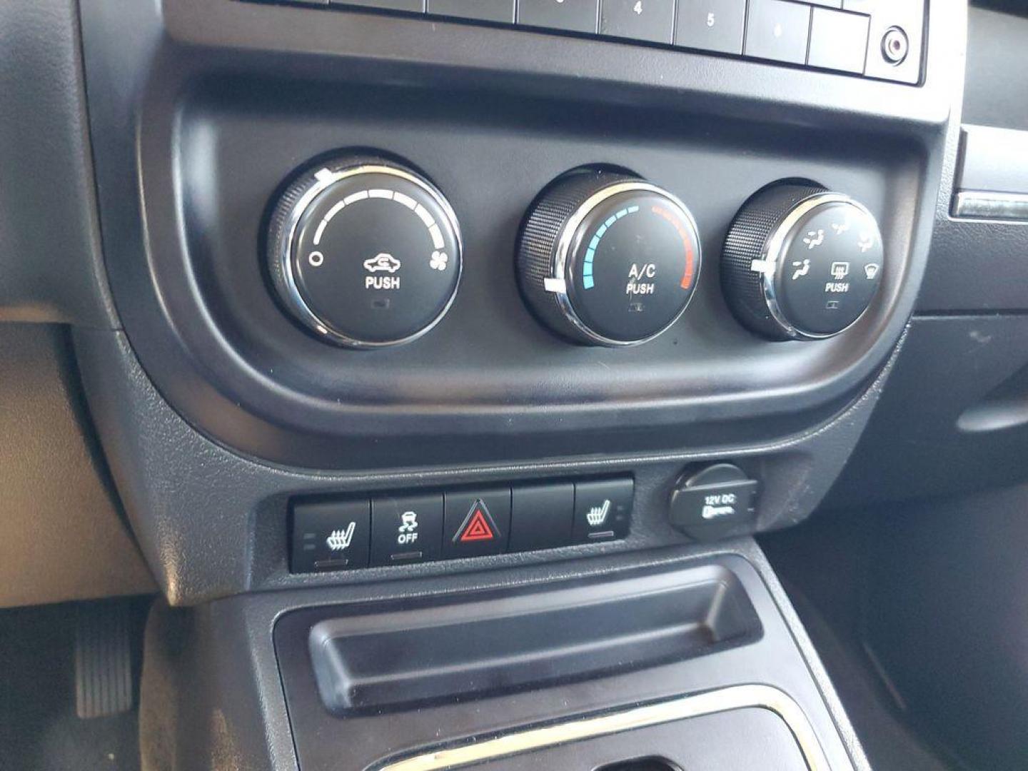2013 Mineral Gray Metallic Clearcoat /Dark Slate Gray Jeep Patriot Latitude 4WD (1C4NJRFB5DD) with an 2.4L L4 DOHC 16V engine, CVT transmission, located at 234 Columbia Ave, Battle Creek, MI, 49015, (269) 222-0088, 42.298264, -85.192543 - When you encounter slick or muddy roads, you can engage the four wheel drive on this model and drive with confidence. Anti-lock brakes will help you stop in an emergency. The Jeep Patriot has a clean CARFAX vehicle history report. Maintaining a stable interior temperature in this vehicle is easy wit - Photo#17