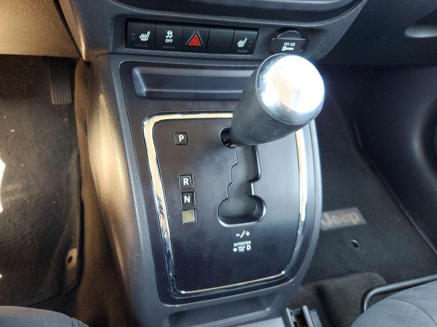 2013 Mineral Gray Metallic Clearcoat /Dark Slate Gray Jeep Patriot Latitude 4WD (1C4NJRFB5DD) with an 2.4L L4 DOHC 16V engine, CVT transmission, located at 234 Columbia Ave, Battle Creek, MI, 49015, (269) 222-0088, 42.298264, -85.192543 - When you encounter slick or muddy roads, you can engage the four wheel drive on this model and drive with confidence. Anti-lock brakes will help you stop in an emergency. The Jeep Patriot has a clean CARFAX vehicle history report. Maintaining a stable interior temperature in this vehicle is easy wit - Photo#18