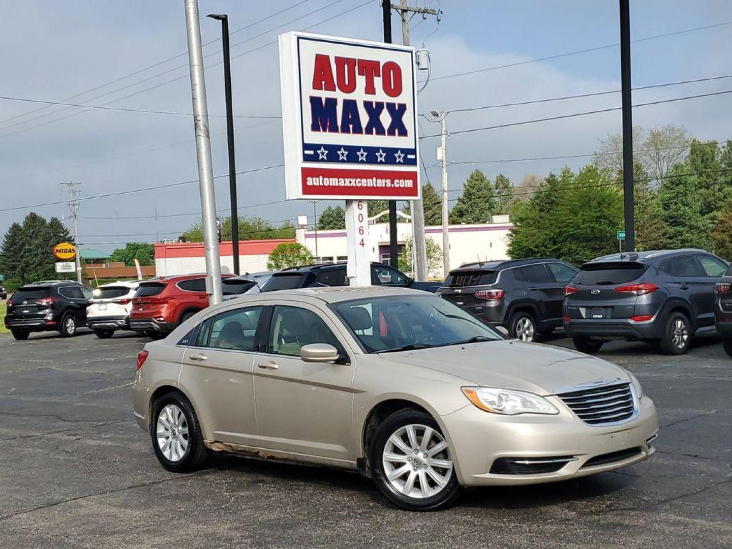 2014 Cashmere Pearlcoat /Light Frost Beige/Black Chrysler 200 LX (1C3CCBAB7EN) with an 2.4L L4 DOHC 16V engine, 6-Speed Automatic transmission, located at 6064 Gull Rd, Kalamazoo, MI, 49048, (269) 222-0088, 42.328388, -85.512924 - Discover the impressive 2014 Chrysler 200 LX, a perfect blend of style and efficiency, now available at an unbeatable price. This well-maintained sedan, featuring a CARFAX Clean Report, offers confidence and peace of mind with every drive. Equipped with front-wheel drive and a robust 4-cylinder, 2.4 - Photo#0
