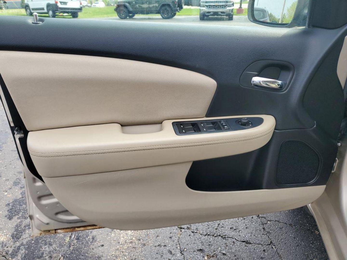 2014 Cashmere Pearlcoat /Light Frost Beige/Black Chrysler 200 LX (1C3CCBAB7EN) with an 2.4L L4 DOHC 16V engine, 6-Speed Automatic transmission, located at 6064 Gull Rd, Kalamazoo, MI, 49048, (269) 222-0088, 42.328388, -85.512924 - Discover the impressive 2014 Chrysler 200 LX, a perfect blend of style and efficiency, now available at an unbeatable price. This well-maintained sedan, featuring a CARFAX Clean Report, offers confidence and peace of mind with every drive. Equipped with front-wheel drive and a robust 4-cylinder, 2.4 - Photo#5