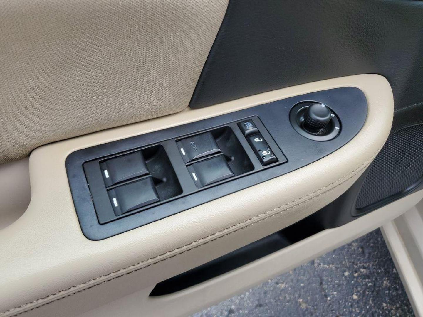 2014 Cashmere Pearlcoat /Light Frost Beige/Black Chrysler 200 LX (1C3CCBAB7EN) with an 2.4L L4 DOHC 16V engine, 6-Speed Automatic transmission, located at 6064 Gull Rd, Kalamazoo, MI, 49048, (269) 222-0088, 42.328388, -85.512924 - Discover the impressive 2014 Chrysler 200 LX, a perfect blend of style and efficiency, now available at an unbeatable price. This well-maintained sedan, featuring a CARFAX Clean Report, offers confidence and peace of mind with every drive. Equipped with front-wheel drive and a robust 4-cylinder, 2.4 - Photo#6