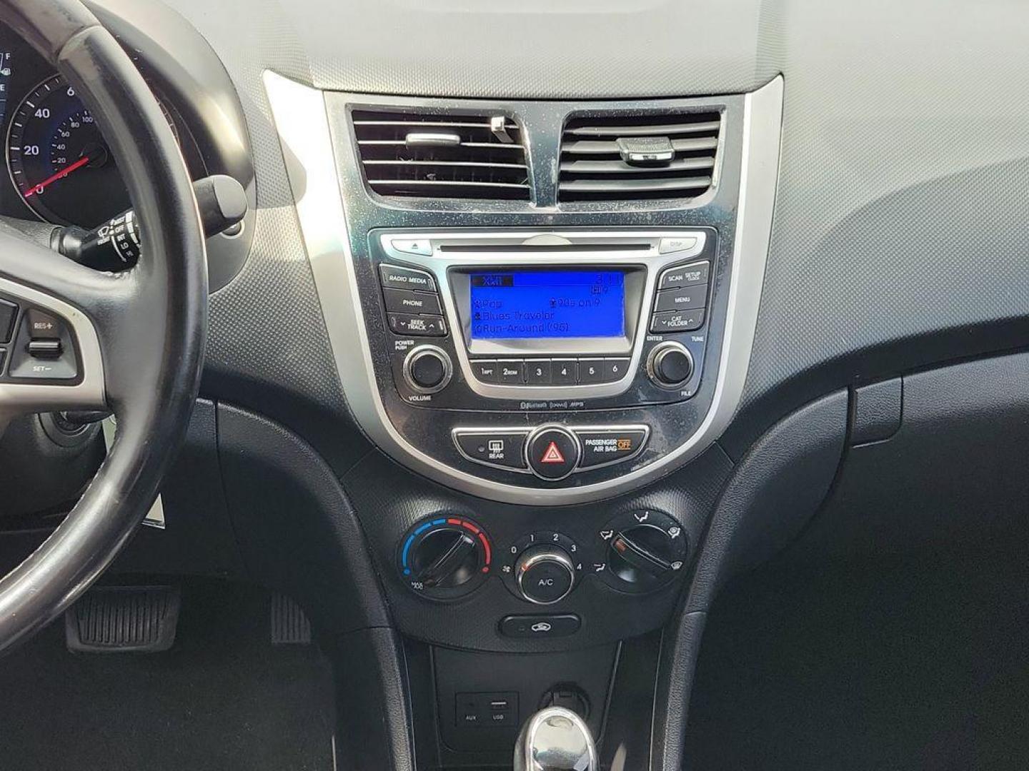 2014 Triathlon Gray Metallic /Black Hyundai Accent SE 5-Door (KMHCU5AE5EU) with an 1.6L L4 DOHC 16V engine, 6-speed automatic transmission, located at 234 Columbia Ave, Battle Creek, MI, 49015, (269) 222-0088, 42.298264, -85.192543 - <b>Vehicle Details</b><br>Discover a fantastic opportunity to own a reliable and efficient 2014 Hyundai Accent SE. Perfect for daily commutes or weekend getaways, this compact sedan offers excellent fuel economy with its 4-cylinder, 1.6L engine. Its a smart choice for those seeking affordability and - Photo#11