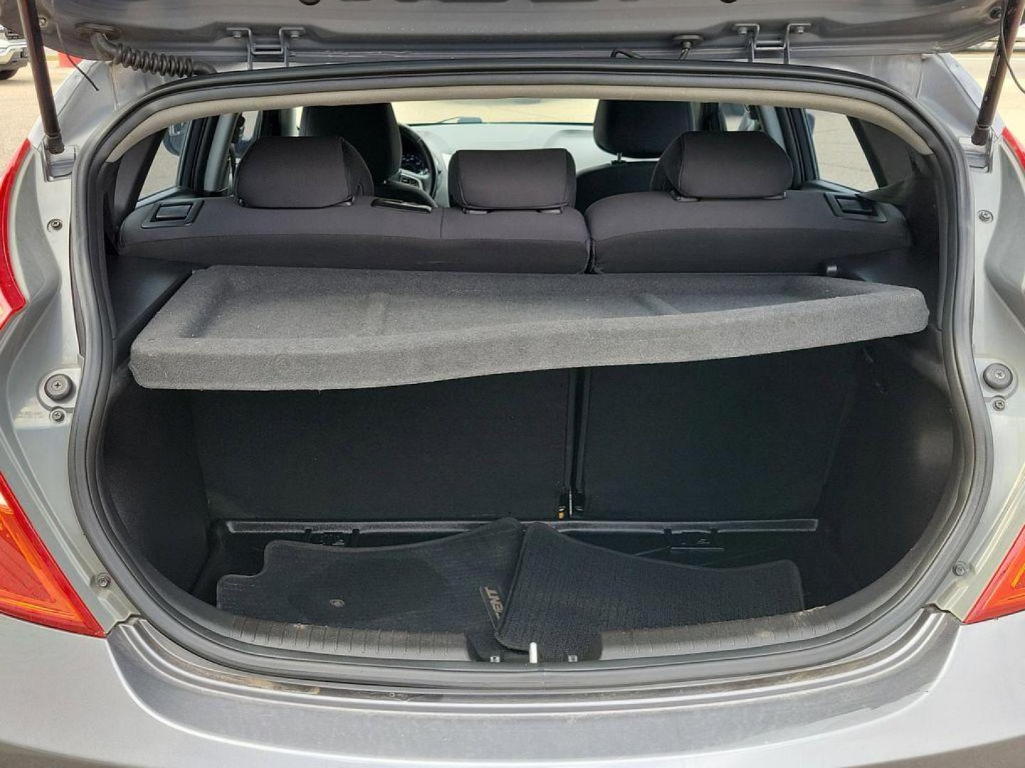 2014 Triathlon Gray Metallic /Black Hyundai Accent SE 5-Door (KMHCU5AE5EU) with an 1.6L L4 DOHC 16V engine, 6-speed automatic transmission, located at 234 Columbia Ave, Battle Creek, MI, 49015, (269) 222-0088, 42.298264, -85.192543 - <b>Vehicle Details</b><br>Discover a fantastic opportunity to own a reliable and efficient 2014 Hyundai Accent SE. Perfect for daily commutes or weekend getaways, this compact sedan offers excellent fuel economy with its 4-cylinder, 1.6L engine. Its a smart choice for those seeking affordability and - Photo#7