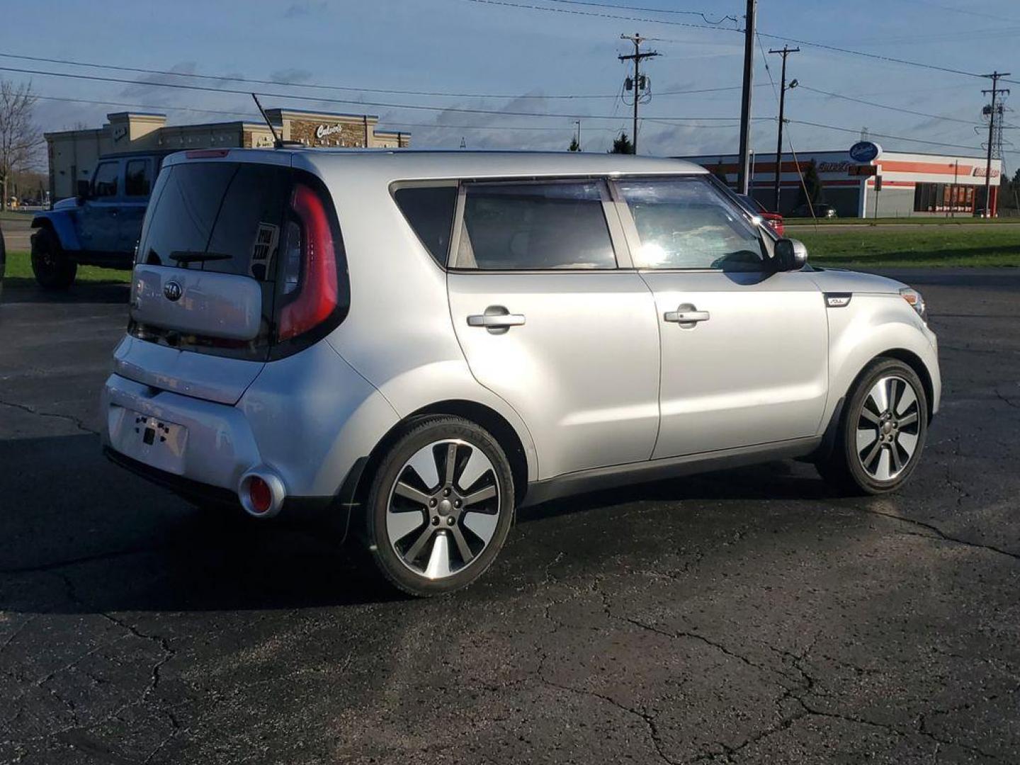 2015 Bright Silver /Black Kia Soul ! (KNDJX3A56F7) with an 2.0L L4 DOHC 16V engine, 6-Speed Automatic transmission, located at 6064 Gull Rd, Kalamazoo, MI, 49048, (269) 222-0088, 42.328388, -85.512924 - <b>Vehicle Details</b><br>The Whole Shabang Package Sun and Sound Package the perfect blend of style, efficiency, and modern features with this 2015 Kia Soul !. This distinctive hatchback is equipped with front-wheel drive and powered by a robust 4-cylinder, 2.0L engine, delivering a smooth and re - Photo#3