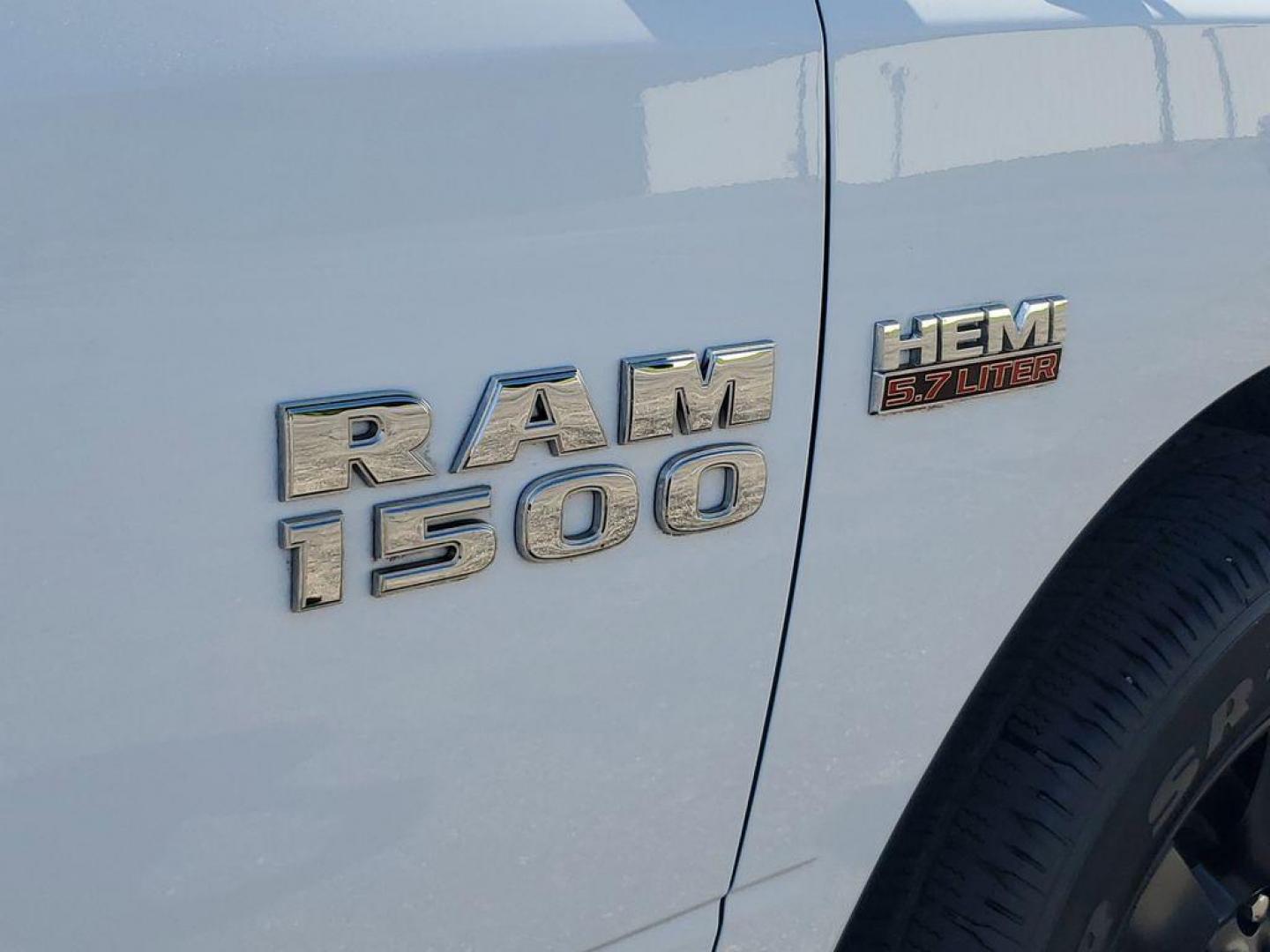 2016 Bright White Clearcoat /Diesel Gray/Black RAM 1500 Tradesman Quad Cab 4WD (1C6RR7FT0GS) with an 5.7L V8 OHV 16V engine, 6A transmission, located at 6064 Gull Rd, Kalamazoo, MI, 49048, (269) 222-0088, 42.328388, -85.512924 - Experience the power and versatility of the 2016 Ram 1500, a robust pickup designed to tackle any challenge. Equipped with a formidable V8, 5.7L engine and 4WD, this truck delivers exceptional performance both on and off the road. With its clean CARFAX report, you can have peace of mind knowing that - Photo#5