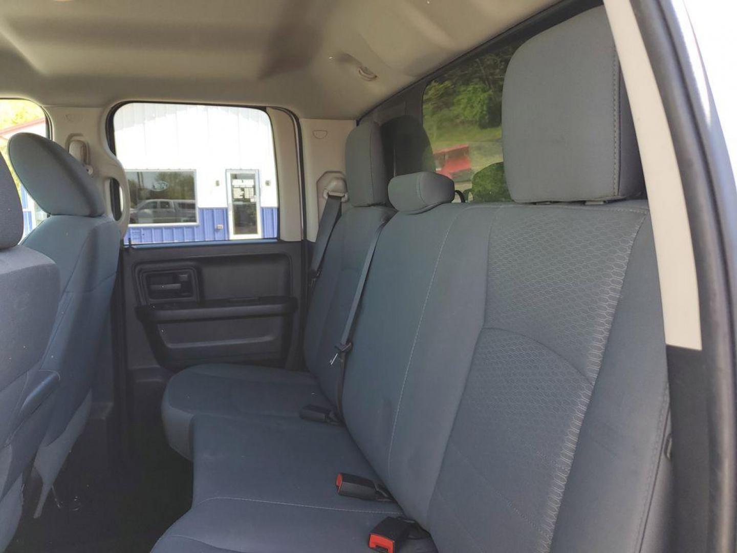 2016 Bright White Clearcoat /Diesel Gray/Black RAM 1500 Tradesman Quad Cab 4WD (1C6RR7FT0GS) with an 5.7L V8 OHV 16V engine, 6A transmission, located at 6064 Gull Rd, Kalamazoo, MI, 49048, (269) 222-0088, 42.328388, -85.512924 - Experience the power and versatility of the 2016 Ram 1500, a robust pickup designed to tackle any challenge. Equipped with a formidable V8, 5.7L engine and 4WD, this truck delivers exceptional performance both on and off the road. With its clean CARFAX report, you can have peace of mind knowing that - Photo#6