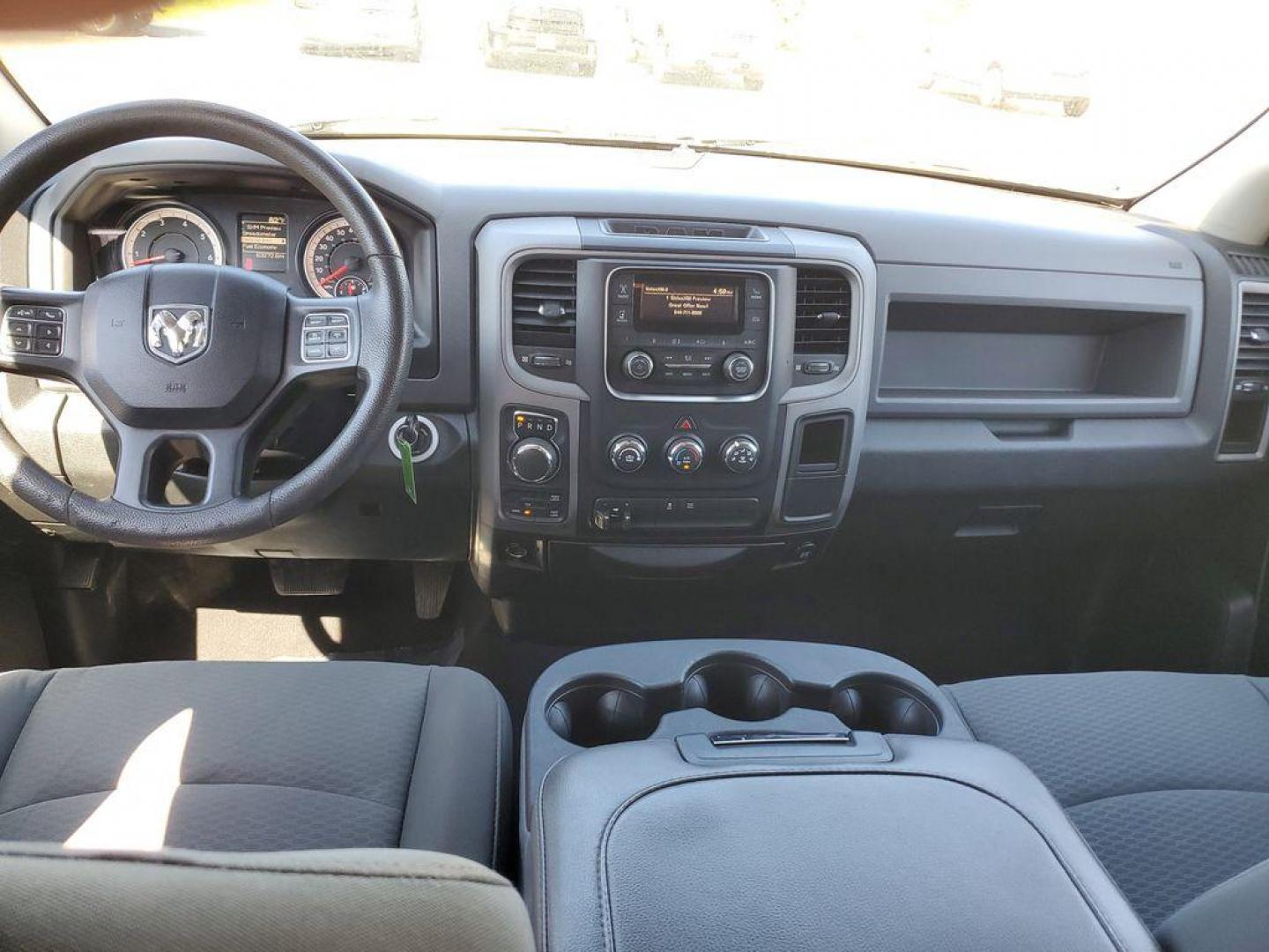 2016 Bright White Clearcoat /Diesel Gray/Black RAM 1500 Tradesman Quad Cab 4WD (1C6RR7FT0GS) with an 5.7L V8 OHV 16V engine, 6A transmission, located at 6064 Gull Rd, Kalamazoo, MI, 49048, (269) 222-0088, 42.328388, -85.512924 - Experience the power and versatility of the 2016 Ram 1500, a robust pickup designed to tackle any challenge. Equipped with a formidable V8, 5.7L engine and 4WD, this truck delivers exceptional performance both on and off the road. With its clean CARFAX report, you can have peace of mind knowing that - Photo#7