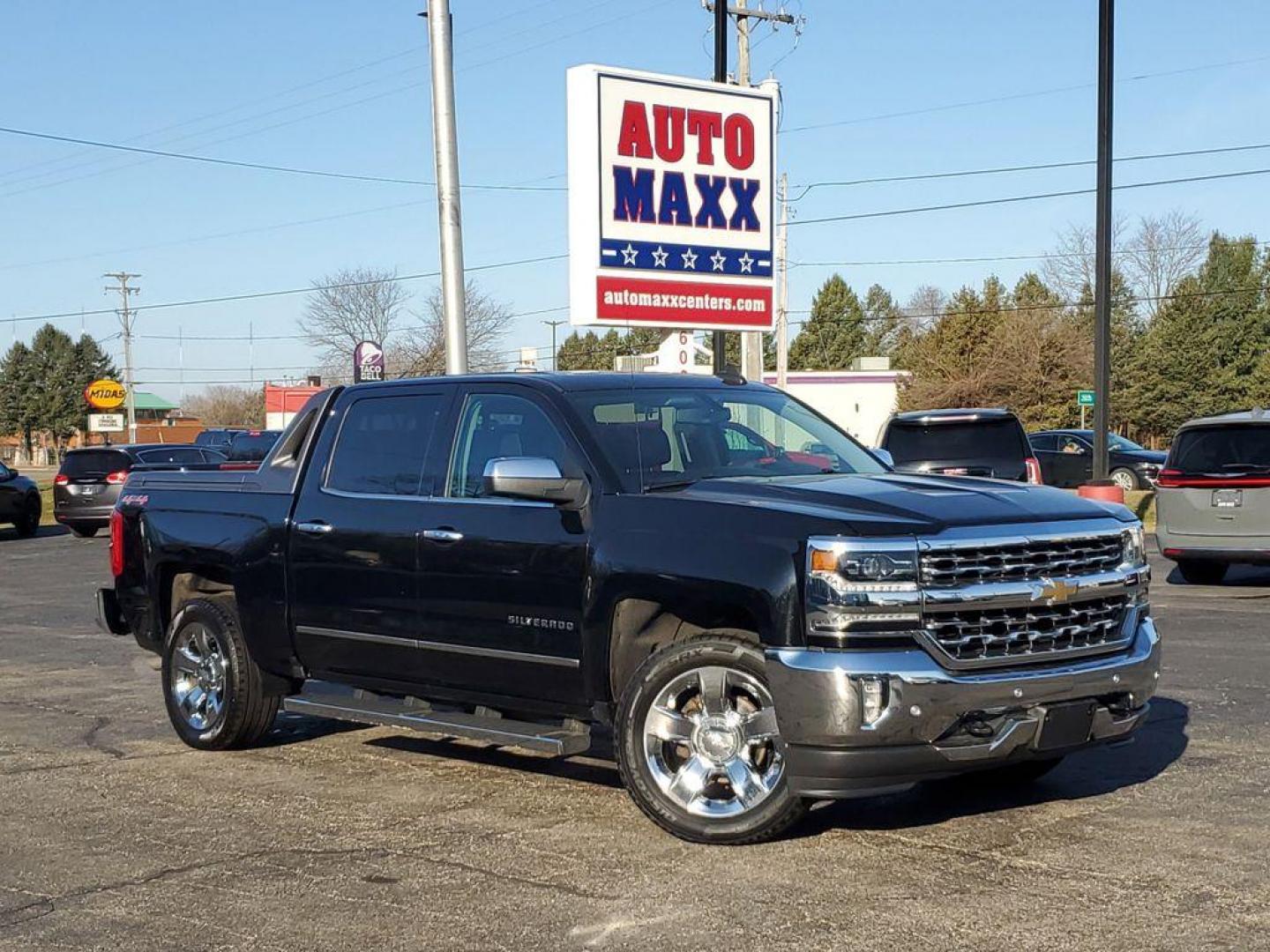 2017 Black /Jet Black Chevrolet Silverado 1500 LTZ Crew Cab Long Box 4WD (3GCUKSEC6HG) with an 5.3L V8 OHV 16V engine, 6A transmission, located at 6064 Gull Rd, Kalamazoo, MI, 49048, (269) 222-0088, 42.328388, -85.512924 - For those seeking a blend of power and luxury, look no further than this exceptional 2017 Chevrolet Silverado 1500 LTZ. This robust pickup combines a commanding V8, 5.3L engine with 4WD capabilities, ensuring you conquer any terrain with confidence. Whether you're navigating city streets or rugged t - Photo#0