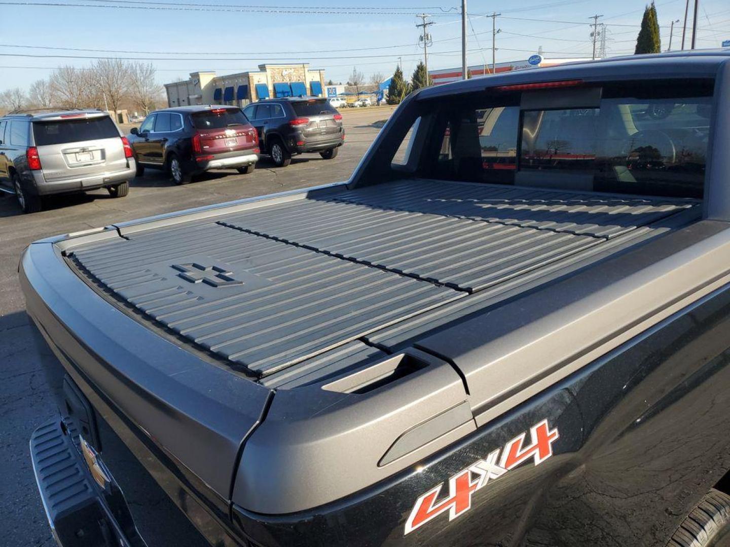 2017 Black /Jet Black Chevrolet Silverado 1500 LTZ Crew Cab Long Box 4WD (3GCUKSEC6HG) with an 5.3L V8 OHV 16V engine, 6A transmission, located at 6064 Gull Rd, Kalamazoo, MI, 49048, (269) 222-0088, 42.328388, -85.512924 - For those seeking a blend of power and luxury, look no further than this exceptional 2017 Chevrolet Silverado 1500 LTZ. This robust pickup combines a commanding V8, 5.3L engine with 4WD capabilities, ensuring you conquer any terrain with confidence. Whether you're navigating city streets or rugged t - Photo#3