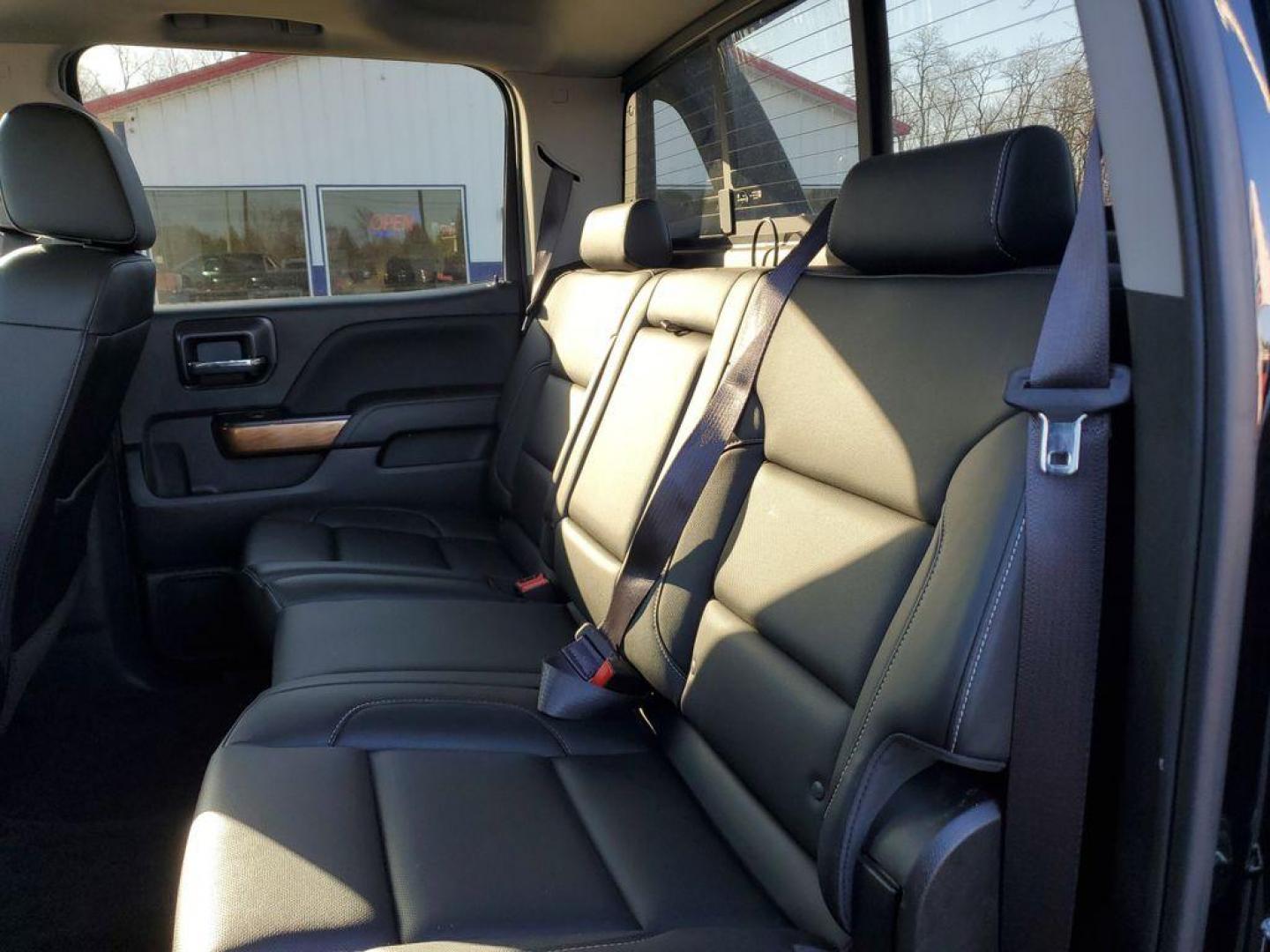 2017 Black /Jet Black Chevrolet Silverado 1500 LTZ Crew Cab Long Box 4WD (3GCUKSEC6HG) with an 5.3L V8 OHV 16V engine, 6A transmission, located at 6064 Gull Rd, Kalamazoo, MI, 49048, (269) 222-0088, 42.328388, -85.512924 - For those seeking a blend of power and luxury, look no further than this exceptional 2017 Chevrolet Silverado 1500 LTZ. This robust pickup combines a commanding V8, 5.3L engine with 4WD capabilities, ensuring you conquer any terrain with confidence. Whether you're navigating city streets or rugged t - Photo#4