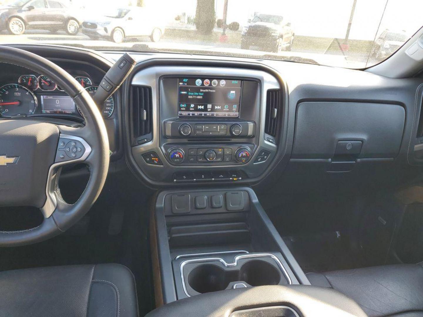 2017 Black /Jet Black Chevrolet Silverado 1500 LTZ Crew Cab Long Box 4WD (3GCUKSEC6HG) with an 5.3L V8 OHV 16V engine, 6A transmission, located at 6064 Gull Rd, Kalamazoo, MI, 49048, (269) 222-0088, 42.328388, -85.512924 - For those seeking a blend of power and luxury, look no further than this exceptional 2017 Chevrolet Silverado 1500 LTZ. This robust pickup combines a commanding V8, 5.3L engine with 4WD capabilities, ensuring you conquer any terrain with confidence. Whether you're navigating city streets or rugged t - Photo#7