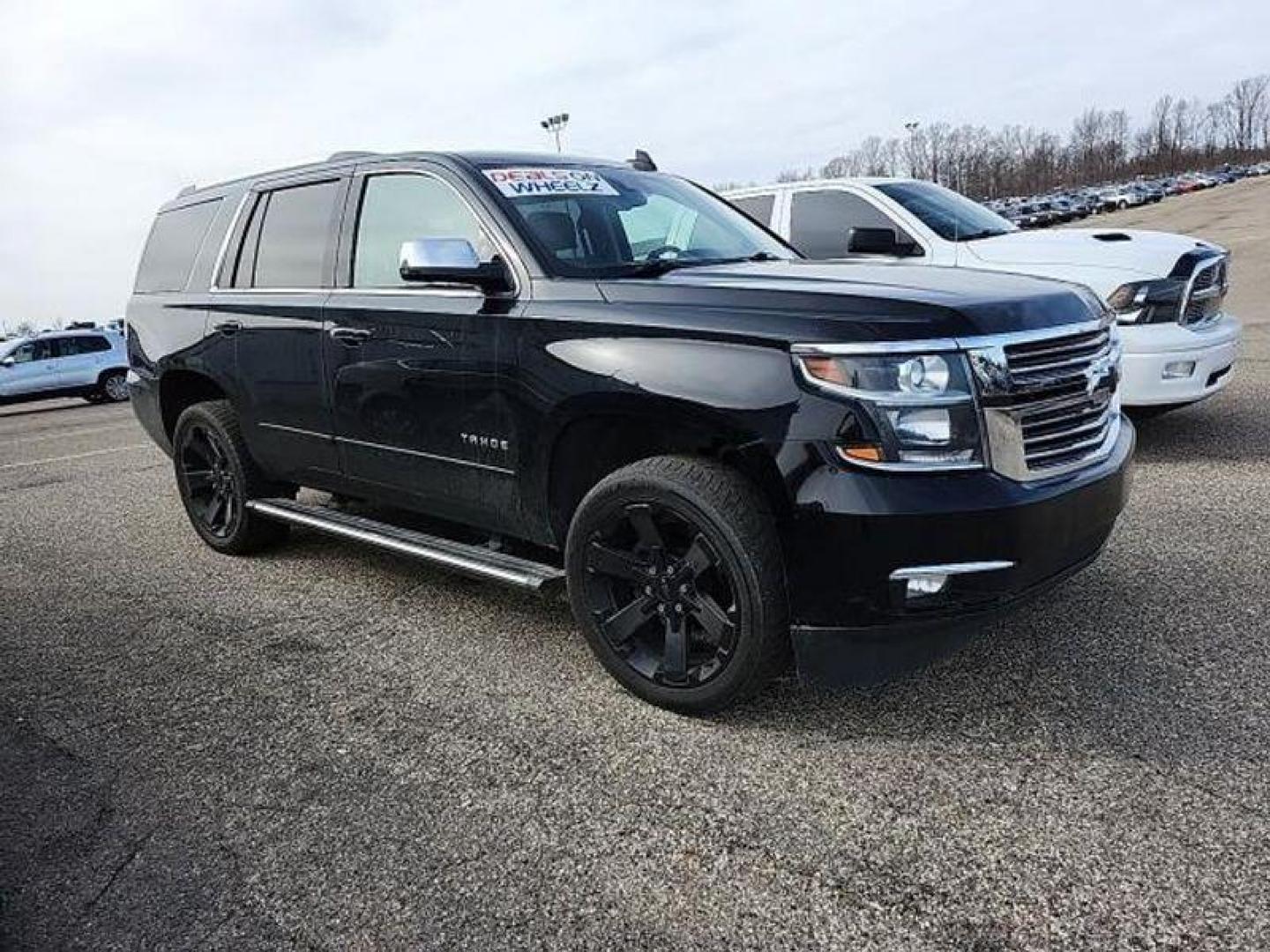 2017 Black Chevrolet Tahoe Premier 4WD (1GNSKCKC2HR) with an 5.3L V8 OHV 16V engine, 6A transmission, located at 6064 Gull Rd, Kalamazoo, MI, 49048, (269) 222-0088, 42.328388, -85.512924 - <b>Vehicle Details</b><br>Discover the remarkable 2017 Chevrolet Tahoe Premier, an extraordinary SUV that combines power, luxury, and reliability. With only 0 miles on the odometer, this pristine vehicle is ready to become your trusted companion on every adventure. Equipped with a formidable V8, 5.3 - Photo#1