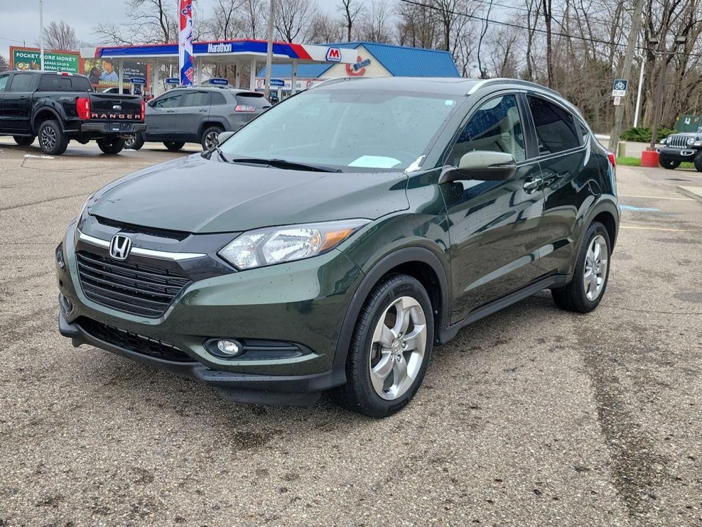 2017 Crystal Black Pearl /Black Honda HR-V EX-L w/Navigation 4WD CVT (3CZRU6H79HM) with an 1.8L L4 DOHC 16V engine, CVT transmission, located at 234 Columbia Ave, Battle Creek, MI, 49015, (269) 222-0088, 42.298264, -85.192543 - <b>Vehicle Details</b><br>Introducing the 2017 Honda HR-V EX-L Navi, a compact crossover designed to cater to your modern driving needs with style and efficiency. This versatile vehicle is powered by a reliable 4-cylinder, 1.8L engine, ensuring a smooth and efficient ride ideal for both city commuti - Photo#1