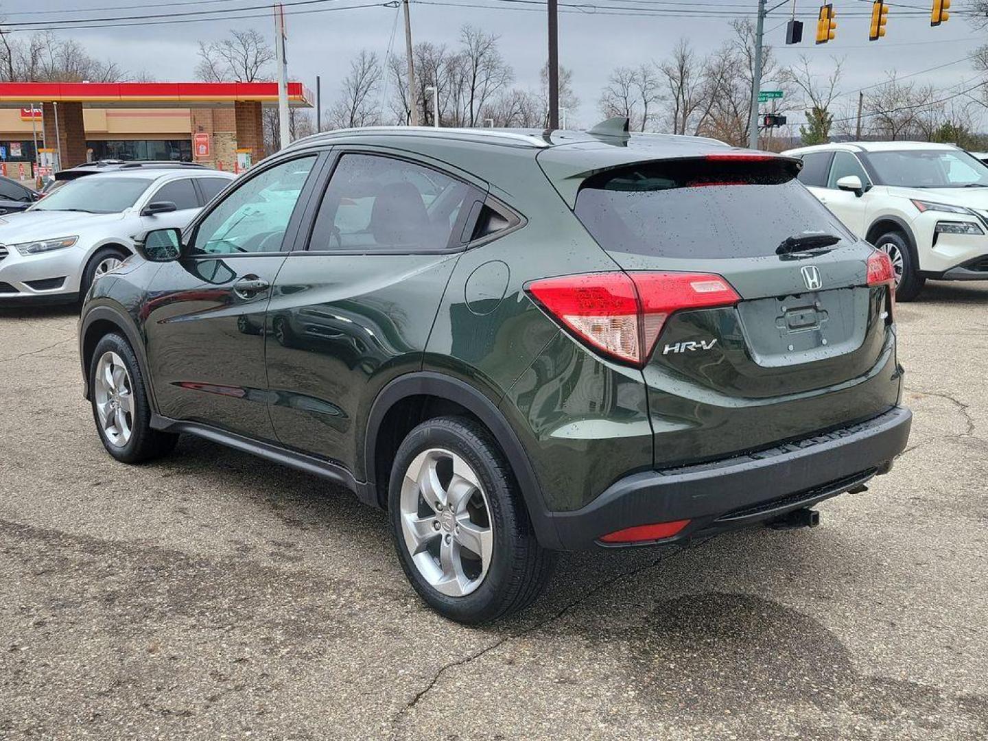 2017 Crystal Black Pearl /Black Honda HR-V EX-L w/Navigation 4WD CVT (3CZRU6H79HM) with an 1.8L L4 DOHC 16V engine, CVT transmission, located at 234 Columbia Ave, Battle Creek, MI, 49015, (269) 222-0088, 42.298264, -85.192543 - <b>Vehicle Details</b><br>Introducing the 2017 Honda HR-V EX-L Navi, a compact crossover designed to cater to your modern driving needs with style and efficiency. This versatile vehicle is powered by a reliable 4-cylinder, 1.8L engine, ensuring a smooth and efficient ride ideal for both city commuti - Photo#2