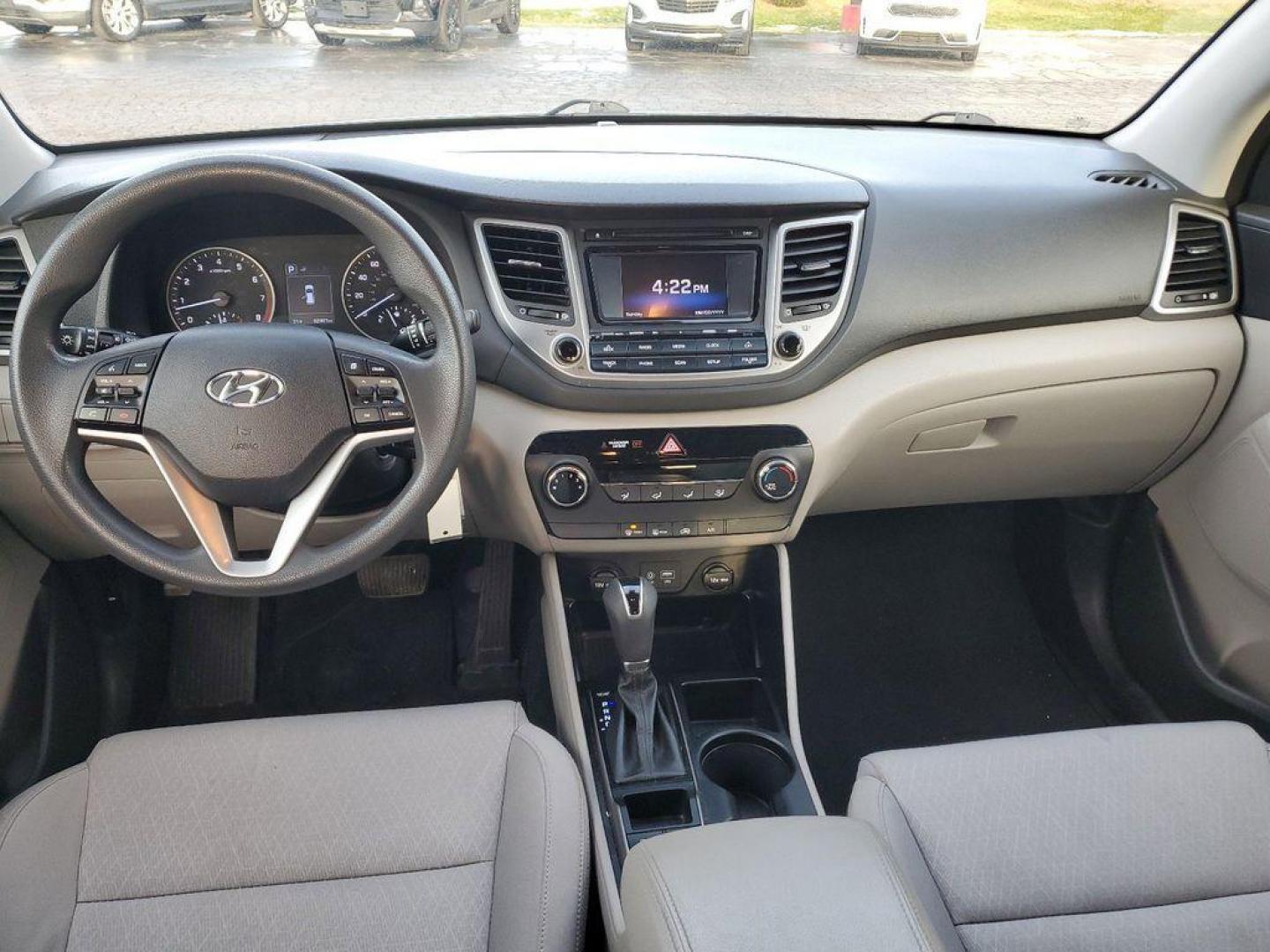 2017 GREY /GREY Hyundai Tucson SE w/Preferred Package AWD (KM8J3CA40HU) with an 2.0L L4 DOHC 16V engine, 6A transmission, located at 6064 Gull Rd, Kalamazoo, MI, 49048, (269) 222-0088, 42.328388, -85.512924 - Introducing the 2017 Hyundai Tucson SE AWD, a versatile and reliable compact SUV ideal for both urban and off-road adventures. This well-maintained vehicle comes with a CARFAX 1-Owner history and a clean report, ensuring peace of mind for its next owner. Under the hood, you'll find a robust 4-cylind - Photo#8