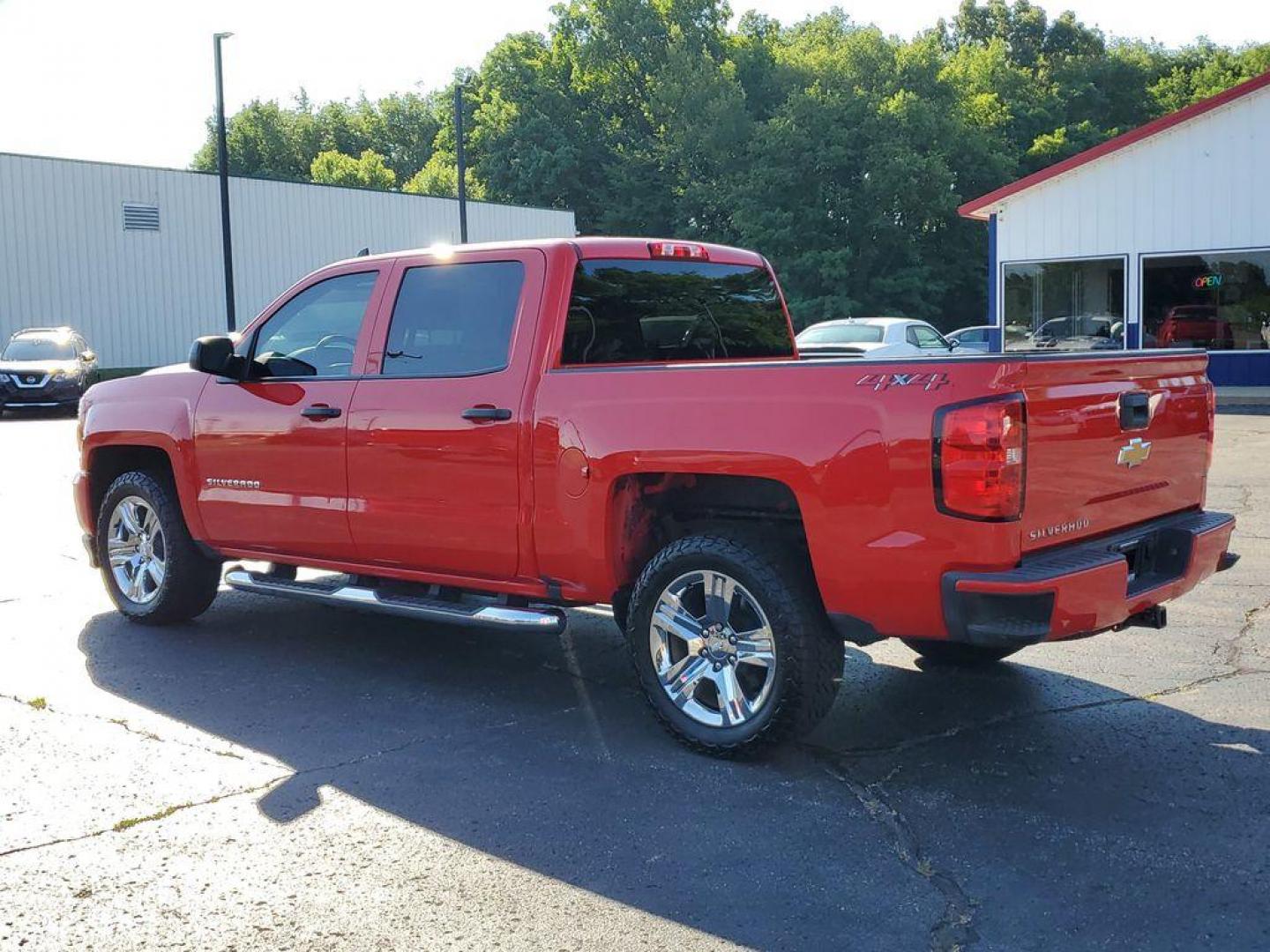 2018 Red Hot /Dark Ash/Jet Black Chevrolet Silverado 1500 Custom Crew Cab 4WD (3GCUKPEC8JG) with an 5.3L V8 OHV 16V engine, 6A transmission, located at 6064 Gull Rd, Kalamazoo, MI, 49048, (269) 222-0088, 42.328388, -85.512924 - For sale: A 2018 Chevrolet Silverado 1500 Custom that perfectly combines power, versatility, and style. This robust truck is equipped with a V8, 5.3L engine, delivering the performance and reliability you need for both work and leisure. Whether you're towing heavy loads or navigating rugged terrain, - Photo#2