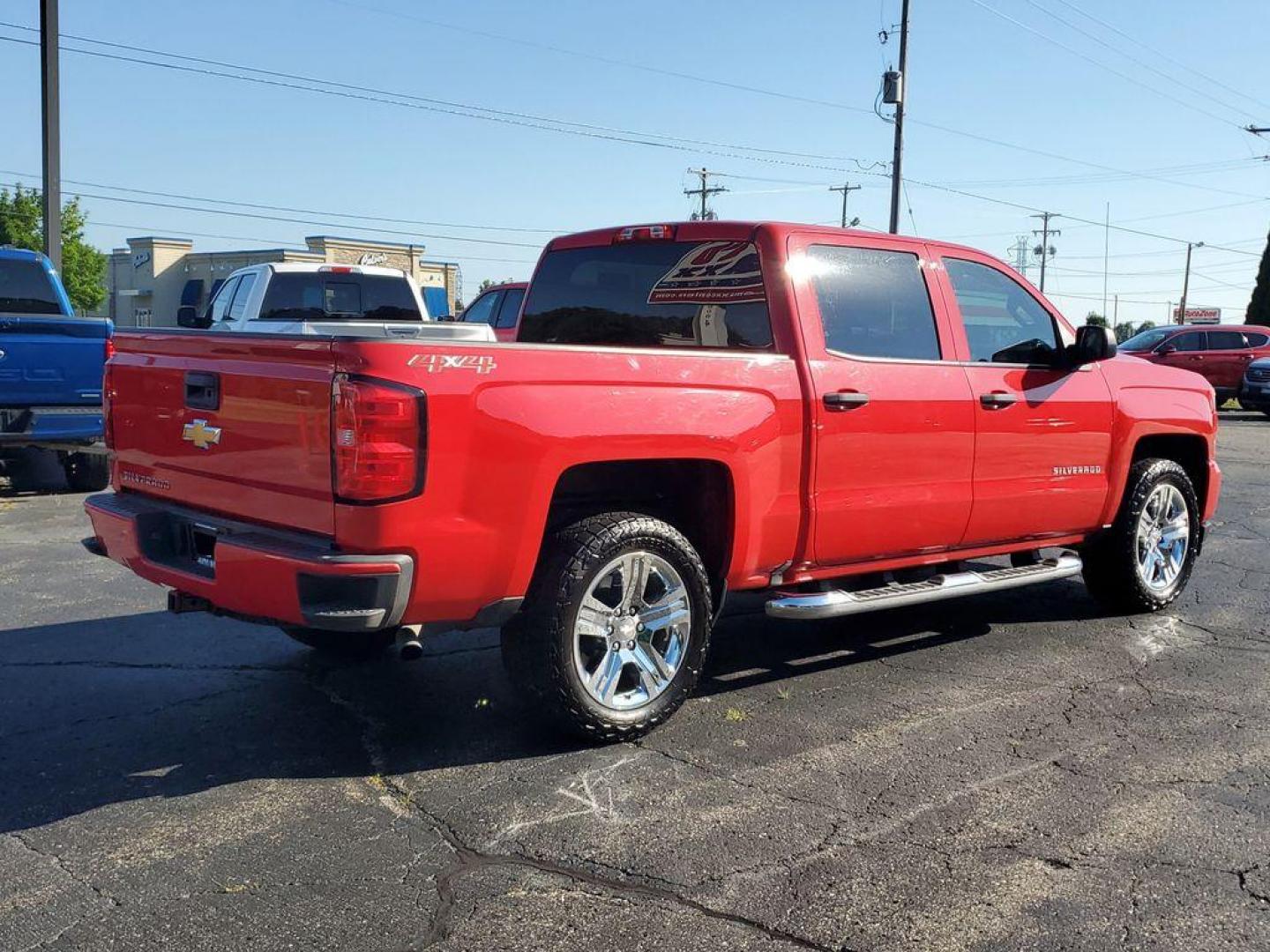 2018 Red Hot /Dark Ash/Jet Black Chevrolet Silverado 1500 Custom Crew Cab 4WD (3GCUKPEC8JG) with an 5.3L V8 OHV 16V engine, 6A transmission, located at 6064 Gull Rd, Kalamazoo, MI, 49048, (269) 222-0088, 42.328388, -85.512924 - For sale: A 2018 Chevrolet Silverado 1500 Custom that perfectly combines power, versatility, and style. This robust truck is equipped with a V8, 5.3L engine, delivering the performance and reliability you need for both work and leisure. Whether you're towing heavy loads or navigating rugged terrain, - Photo#3