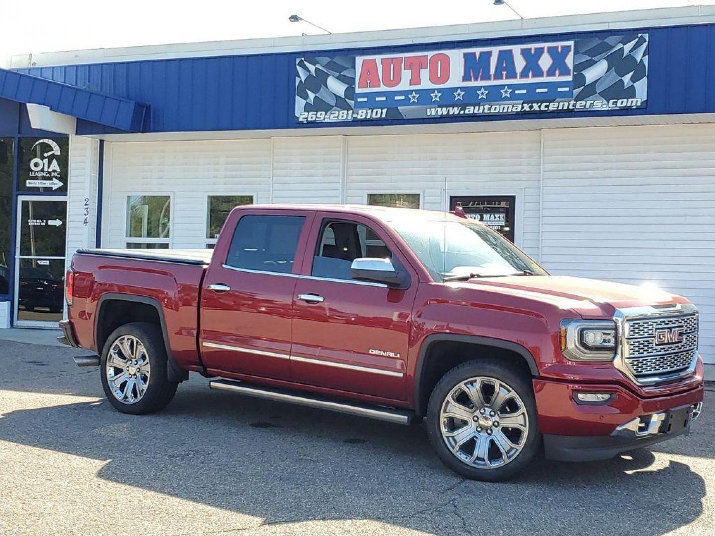 2018 Red Quartz Tintcoat /Jet Black GMC Sierra 1500 Denali Crew Cab Long Box 4WD (3GTU2PEJ9JG) with an 6.2L V8 OHV 16V engine, 6A transmission, located at 6064 Gull Rd, Kalamazoo, MI, 49048, (269) 222-0088, 42.328388, -85.512924 - <b>Vehicle Details</b><br>Discover the power and luxury of the 2018 GMC Sierra 1500 Denali at our dealership. This pre-owned gem comes equipped with a robust V8, 6.2L engine and 4WD, ensuring you have the muscle and traction needed for any adventure or tough job. Step inside to experience true com - Photo#0