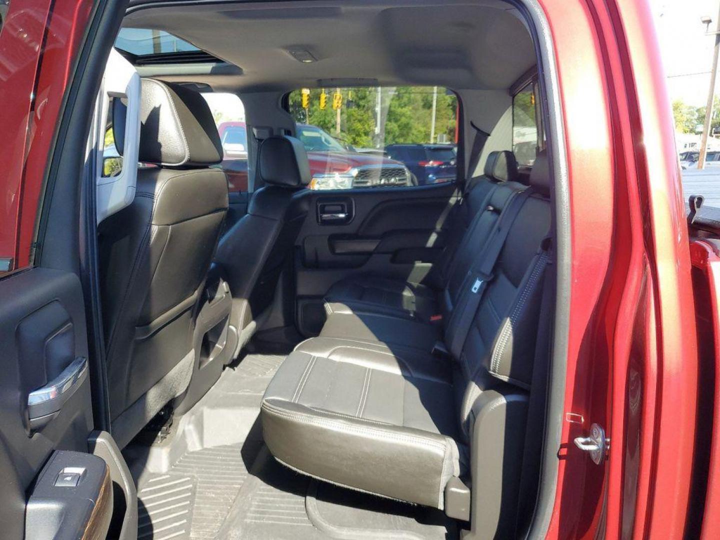 2018 Red Quartz Tintcoat /Jet Black GMC Sierra 1500 Denali Crew Cab Long Box 4WD (3GTU2PEJ9JG) with an 6.2L V8 OHV 16V engine, 6A transmission, located at 6064 Gull Rd, Kalamazoo, MI, 49048, (269) 222-0088, 42.328388, -85.512924 - <b>Vehicle Details</b><br>Discover the power and luxury of the 2018 GMC Sierra 1500 Denali at our dealership. This pre-owned gem comes equipped with a robust V8, 6.2L engine and 4WD, ensuring you have the muscle and traction needed for any adventure or tough job. Step inside to experience true com - Photo#27
