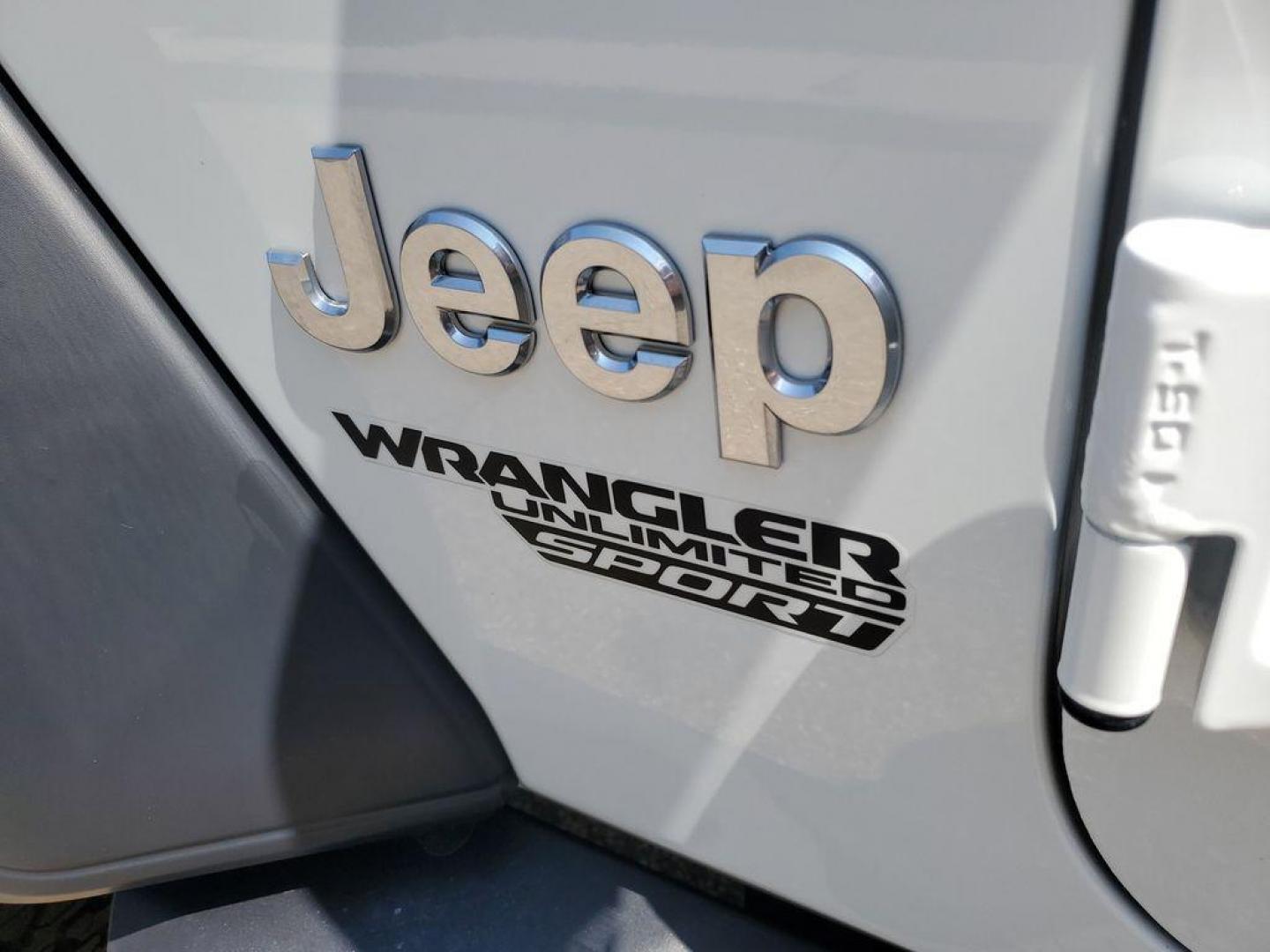 2018 Bright White Clearcoat /Black Jeep Wrangler JK Unlimited Sport (1C4HJXDG9JW) with an 3.6L V6 DOHC 24V FFV engine, 6A transmission, located at 234 Columbia Ave, Battle Creek, MI, 49015, (269) 222-0088, 42.298264, -85.192543 - <b>Vehicle Details</b><br>Unleash your adventurous spirit with this stunning 2018 Jeep Wrangler Sport S! Engineered for excitement and built to conquer any terrain, this dynamic 4WD powerhouse is equipped with a robust V6, 3.6L engine that delivers exceptional performance and reliability. Whether yo - Photo#27