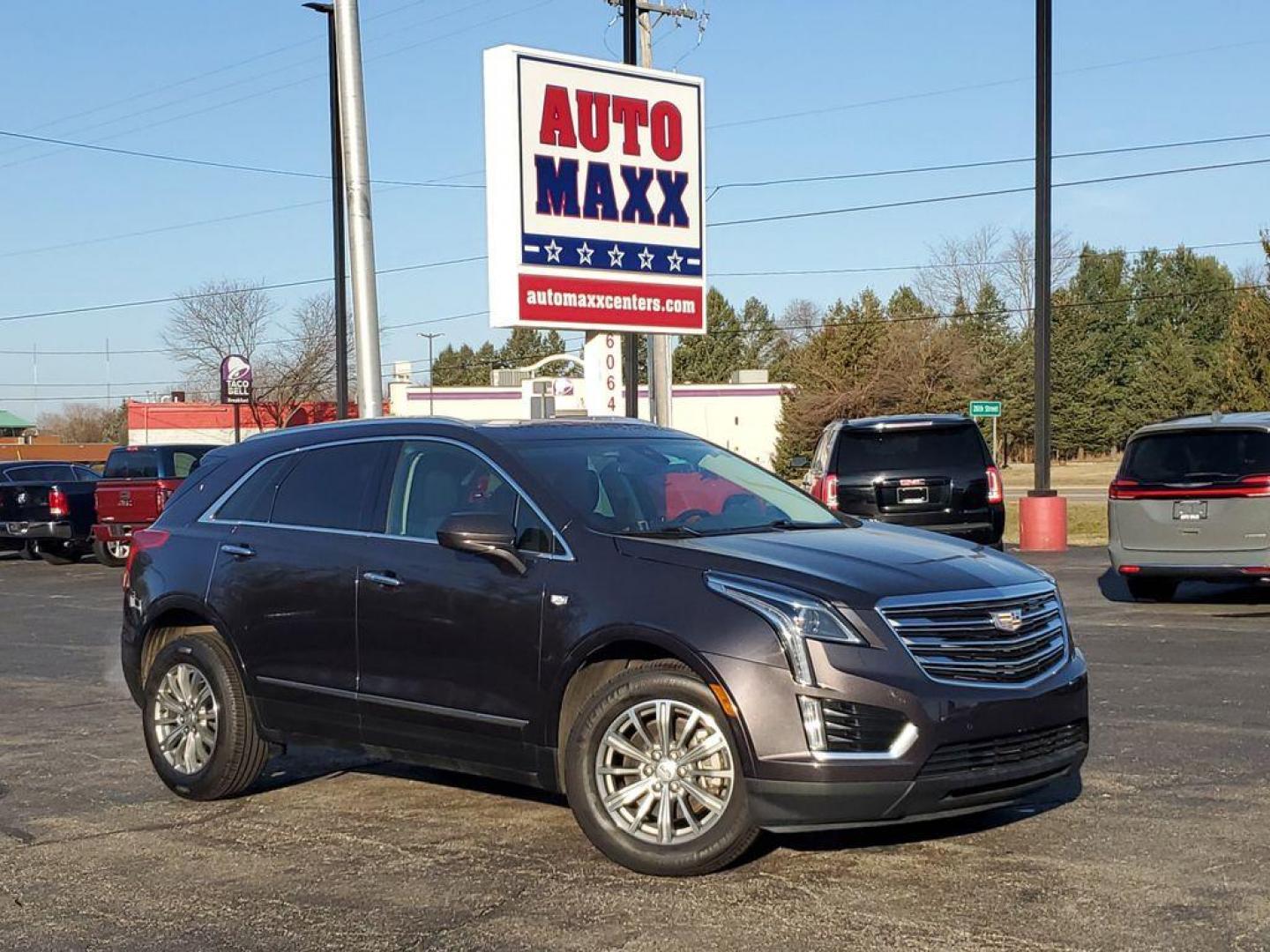 2019 Dark Granite Metallic /Jet Black Cadillac XT5 Luxury AWD (1GYKNDRS2KZ) with an 3.6L V6 DOHC 24V engine, 8A transmission, located at 6064 Gull Rd, Kalamazoo, MI, 49048, (269) 222-0088, 42.328388, -85.512924 - <b>Summary</b><br>Power Moonroof<br><br><b>Vehicle Details</b><br>Discover exceptional performance and luxury with our 2019 Cadillac XT5 Luxury AWD, equipped with a robust V6, 3.6L engine. This sophisticated SUV seamlessly blends power and elegance, offering a driving experience that is both exhilar - Photo#0