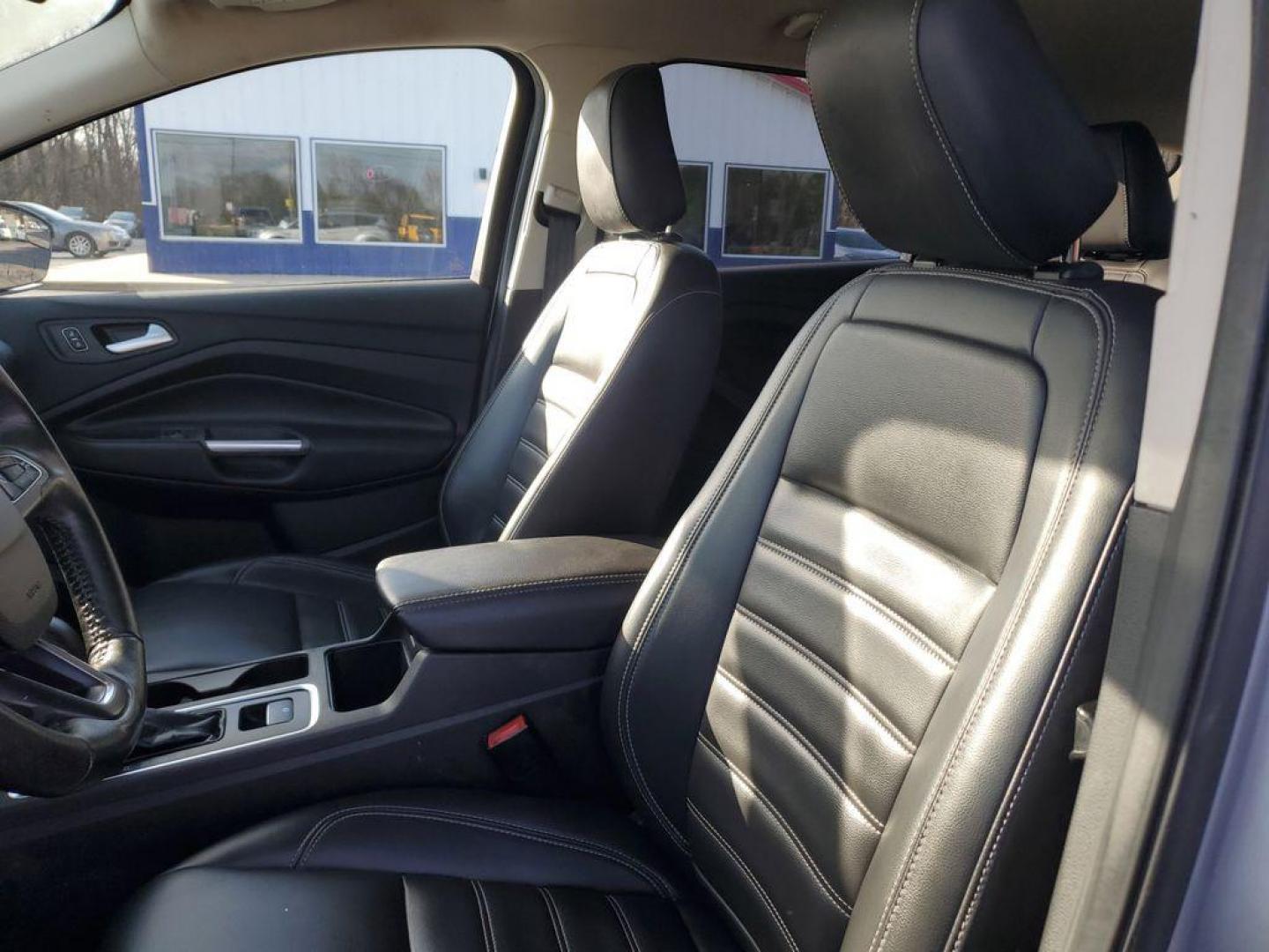 2019 Ingot Silver Metallic /Charcoal Black Ford Escape SEL 4WD (1FMCU9HD7KU) with an 1.5L L4 DOHC 16V engine, 6A transmission, located at 6064 Gull Rd, Kalamazoo, MI, 49048, (269) 222-0088, 42.328388, -85.512924 - Discover exceptional versatility with our 2019 Ford Escape SEL, designed to elevate your driving experience. This stylish SUV, equipped with 4WD and a responsive 4-cylinder, 1.5L engine, offers a perfect blend of power and efficiency for any adventure.<br><br>Step inside to find a spacious, well-app - Photo#14