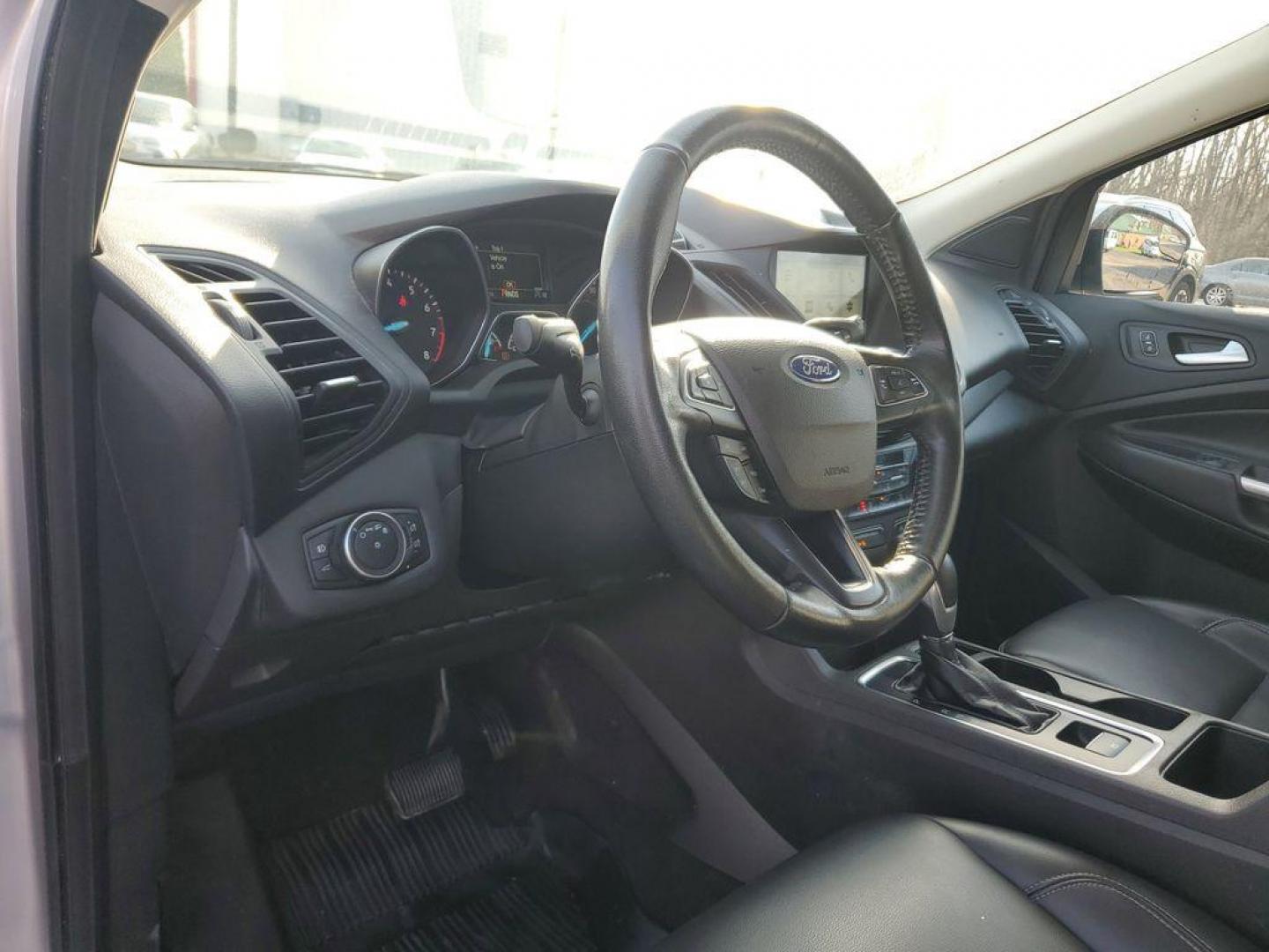 2019 Ingot Silver Metallic /Charcoal Black Ford Escape SEL 4WD (1FMCU9HD7KU) with an 1.5L L4 DOHC 16V engine, 6A transmission, located at 6064 Gull Rd, Kalamazoo, MI, 49048, (269) 222-0088, 42.328388, -85.512924 - Discover exceptional versatility with our 2019 Ford Escape SEL, designed to elevate your driving experience. This stylish SUV, equipped with 4WD and a responsive 4-cylinder, 1.5L engine, offers a perfect blend of power and efficiency for any adventure.<br><br>Step inside to find a spacious, well-app - Photo#15
