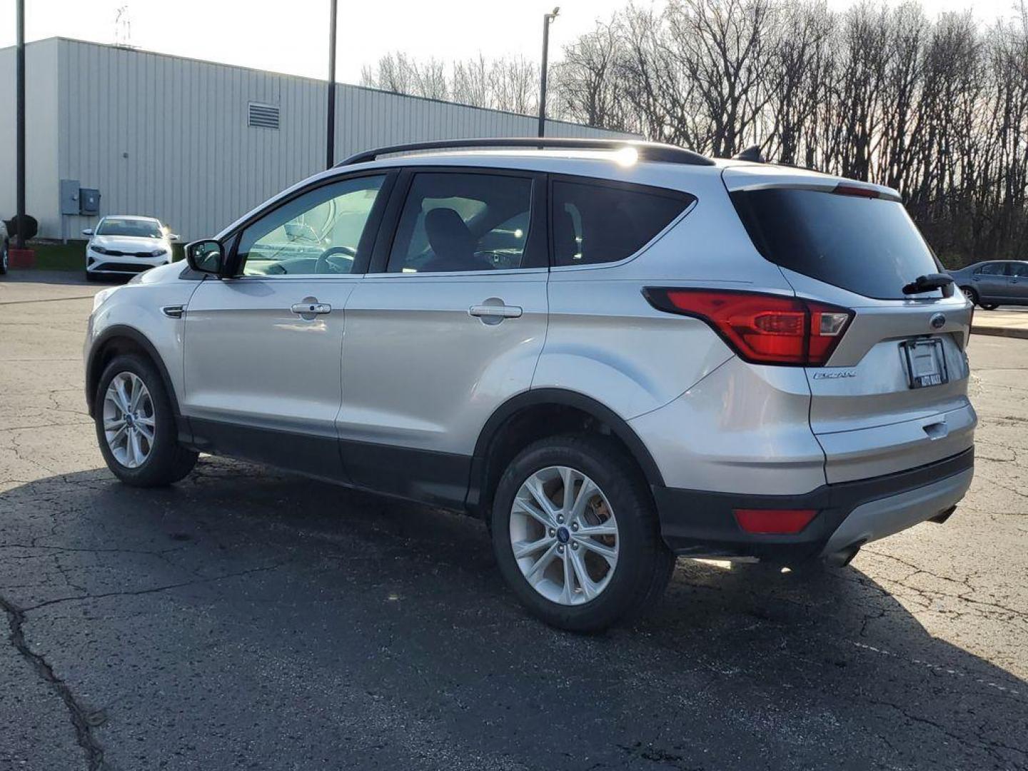 2019 Ingot Silver Metallic /Charcoal Black Ford Escape SEL 4WD (1FMCU9HD7KU) with an 1.5L L4 DOHC 16V engine, 6A transmission, located at 6064 Gull Rd, Kalamazoo, MI, 49048, (269) 222-0088, 42.328388, -85.512924 - Discover exceptional versatility with our 2019 Ford Escape SEL, designed to elevate your driving experience. This stylish SUV, equipped with 4WD and a responsive 4-cylinder, 1.5L engine, offers a perfect blend of power and efficiency for any adventure.<br><br>Step inside to find a spacious, well-app - Photo#2
