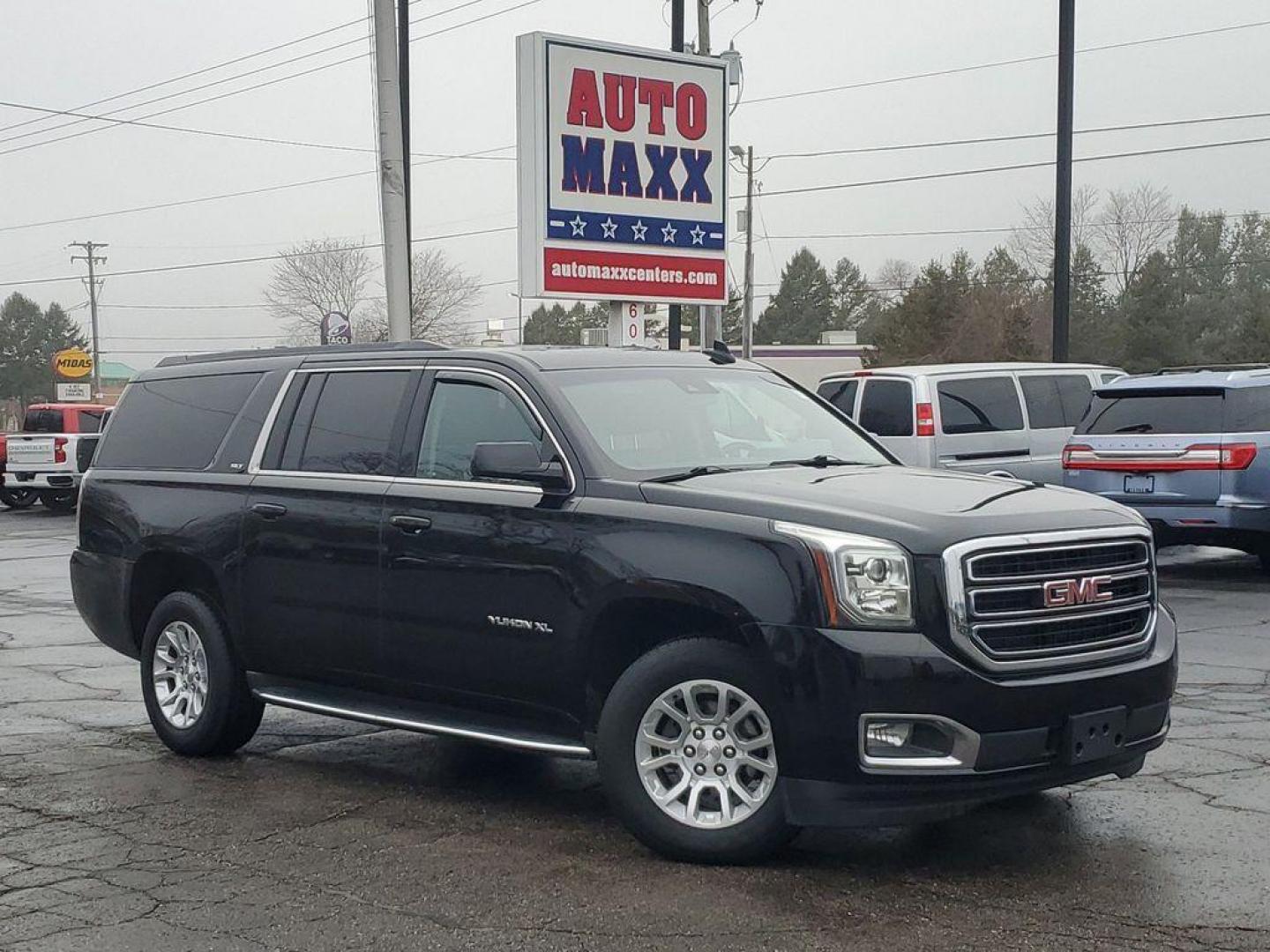 2019 /BLACK GMC Yukon XL SLT 4WD (1GKS2GKC2KR) with an 5.3L V8 OHV 16V engine, 6A transmission, located at 6064 Gull Rd, Kalamazoo, MI, 49048, (269) 222-0088, 42.328388, -85.512924 - Discover the exceptional 2019 GMC Yukon XL 1500 SLT, a versatile and powerful full-size SUV designed to meet all your driving needs. Equipped with a robust V8, 5.3L engine and 4WD capabilities, this vehicle ensures a smooth and commanding drive, whether navigating city streets or exploring off-road - Photo#0