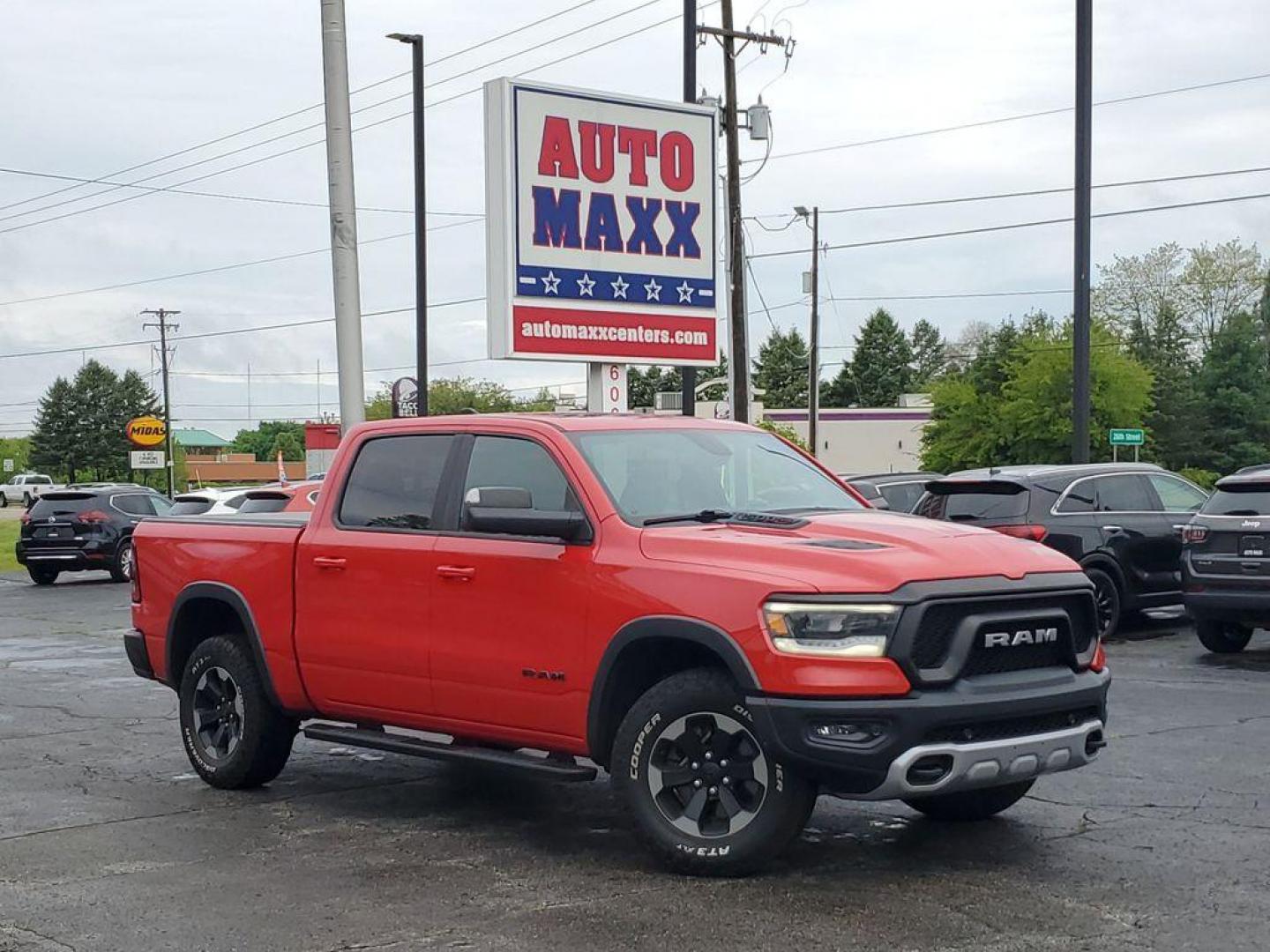 2019 Flame Red Clearcoat /Red/Black RAM 1500 Rebel Crew Cab SB 4WD (1C6SRFLT8KN) with an 5.7L V8 OHV 16V engine, 8A transmission, located at 6064 Gull Rd, Kalamazoo, MI, 49048, (269) 222-0088, 42.328388, -85.512924 - <b>Summary</b><br>Power Moonroof NAVIGATION PACKAGE<br><br><b>Vehicle Details</b><br>Discover the impressive capabilities of the 2019 Ram 1500 Rebel, a robust and reliable pickup designed to tackle any challenge with confidence. Equipped with a powerful V8, 5.7L engine, this 4WD powerhouse delivers - Photo#0