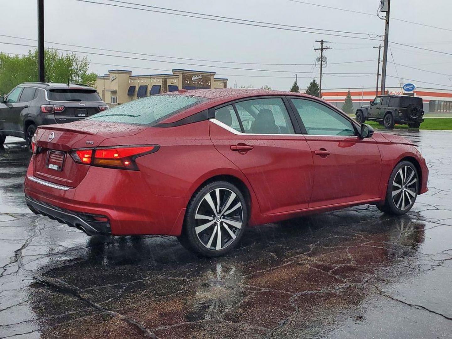 2020 Scarlet Ember Tintcoat /Sport Nissan Altima 2.5 SR (1N4BL4CV7LN) with an 2.5L L4 DOHC 16V engine, CVT transmission, located at 6064 Gull Rd, Kalamazoo, MI, 49048, (269) 222-0088, 42.328388, -85.512924 - <b>Vehicle Details</b><br>Discover the unparalleled blend of style, performance, and technology with the 2020 Nissan Altima 2.5 SR. This sophisticated sedan, featuring a pristine 0 miles, offers an exceptional driving experience with its efficient and dynamic 4-cylinder, 2.5L engine. Equipped with f - Photo#3