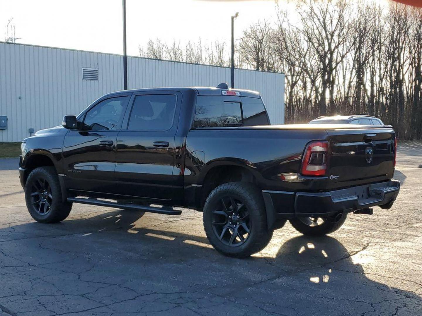 2020 Diamond Black Crystal Pearl /Black RAM 1500 Rebel Crew Cab SB 4WD (1C6SRFLT2LN) with an 5.7L V8 OHV 16V engine, 8A transmission, located at 6064 Gull Rd, Kalamazoo, MI, 49048, (269) 222-0088, 42.328388, -85.512924 - <b>Vehicle Details</b><br>Unleash the power and sophistication of the 2020 Ram 1500 Sport, an exceptional truck that promises to elevate your driving experience to new heights. With zero miles on the odometer, this rugged beast is practically untouched, ready to conquer any terrain you throw its way - Photo#2