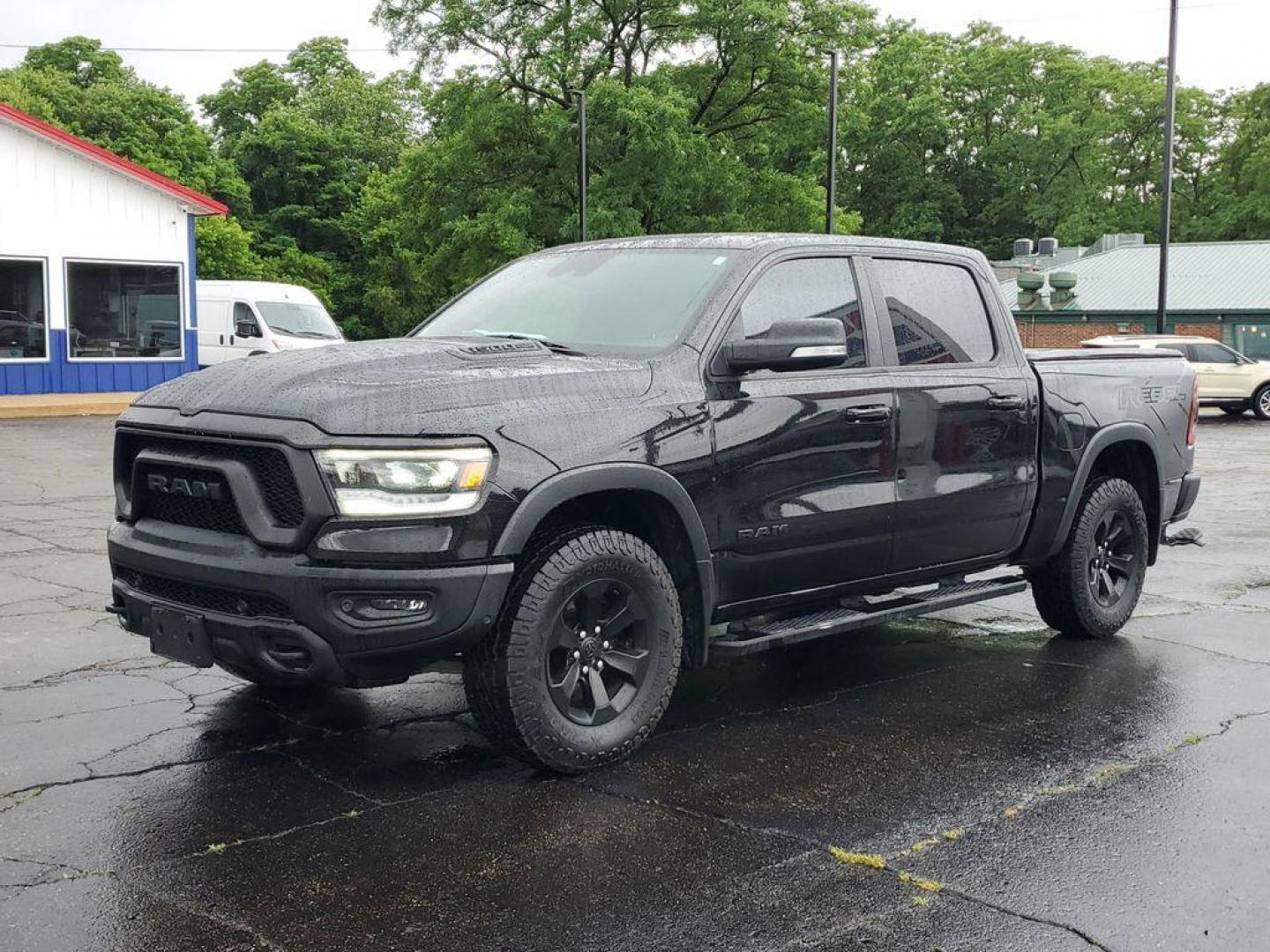 2020 Diamond Black Crystal Pearl /BLACK RAM 1500 Rebel Crew Cab SB 4WD (1C6SRFLT0LN) with an 5.7L V8 OHV 16V engine, 8A transmission, located at 6064 Gull Rd, Kalamazoo, MI, 49048, (269) 222-0088, 42.328388, -85.512924 - <b>Summary</b><br>Power Moonroof Uconnect 12.0Inch with Navigation<br><br><b>Vehicle Details</b><br>For sale: a robust and reliable 2020 Ram 1500 Rebel, perfect for both adventure seekers and those in need of a dependable workhorse. This versatile pickup is powered by a formidable V8, 5.7L engine an - Photo#1