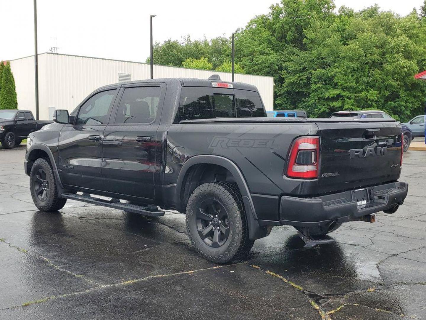 2020 Diamond Black Crystal Pearl /BLACK RAM 1500 Rebel Crew Cab SB 4WD (1C6SRFLT0LN) with an 5.7L V8 OHV 16V engine, 8A transmission, located at 6064 Gull Rd, Kalamazoo, MI, 49048, (269) 222-0088, 42.328388, -85.512924 - <b>Summary</b><br>Power Moonroof Uconnect 12.0Inch with Navigation<br><br><b>Vehicle Details</b><br>For sale: a robust and reliable 2020 Ram 1500 Rebel, perfect for both adventure seekers and those in need of a dependable workhorse. This versatile pickup is powered by a formidable V8, 5.7L engine an - Photo#2