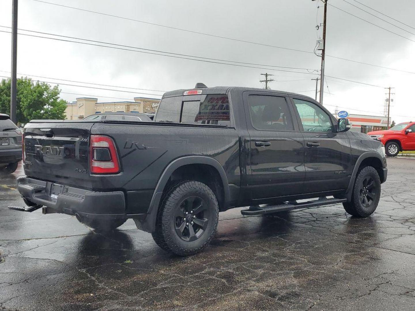 2020 Diamond Black Crystal Pearl /BLACK RAM 1500 Rebel Crew Cab SB 4WD (1C6SRFLT0LN) with an 5.7L V8 OHV 16V engine, 8A transmission, located at 6064 Gull Rd, Kalamazoo, MI, 49048, (269) 222-0088, 42.328388, -85.512924 - <b>Summary</b><br>Power Moonroof Uconnect 12.0Inch with Navigation<br><br><b>Vehicle Details</b><br>For sale: a robust and reliable 2020 Ram 1500 Rebel, perfect for both adventure seekers and those in need of a dependable workhorse. This versatile pickup is powered by a formidable V8, 5.7L engine an - Photo#3