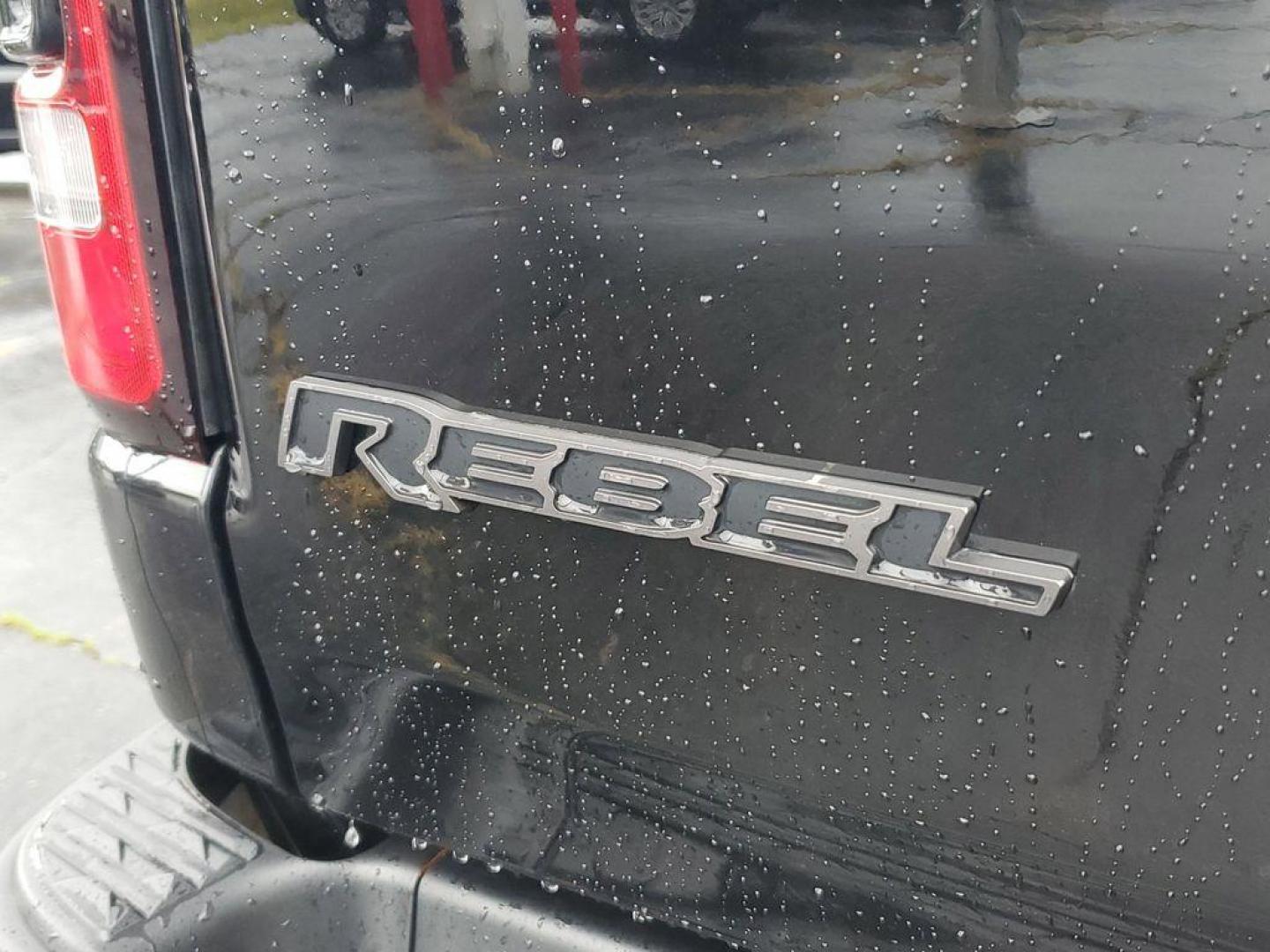 2020 Diamond Black Crystal Pearl /BLACK RAM 1500 Rebel Crew Cab SB 4WD (1C6SRFLT0LN) with an 5.7L V8 OHV 16V engine, 8A transmission, located at 6064 Gull Rd, Kalamazoo, MI, 49048, (269) 222-0088, 42.328388, -85.512924 - <b>Summary</b><br>Power Moonroof Uconnect 12.0Inch with Navigation<br><br><b>Vehicle Details</b><br>For sale: a robust and reliable 2020 Ram 1500 Rebel, perfect for both adventure seekers and those in need of a dependable workhorse. This versatile pickup is powered by a formidable V8, 5.7L engine an - Photo#5