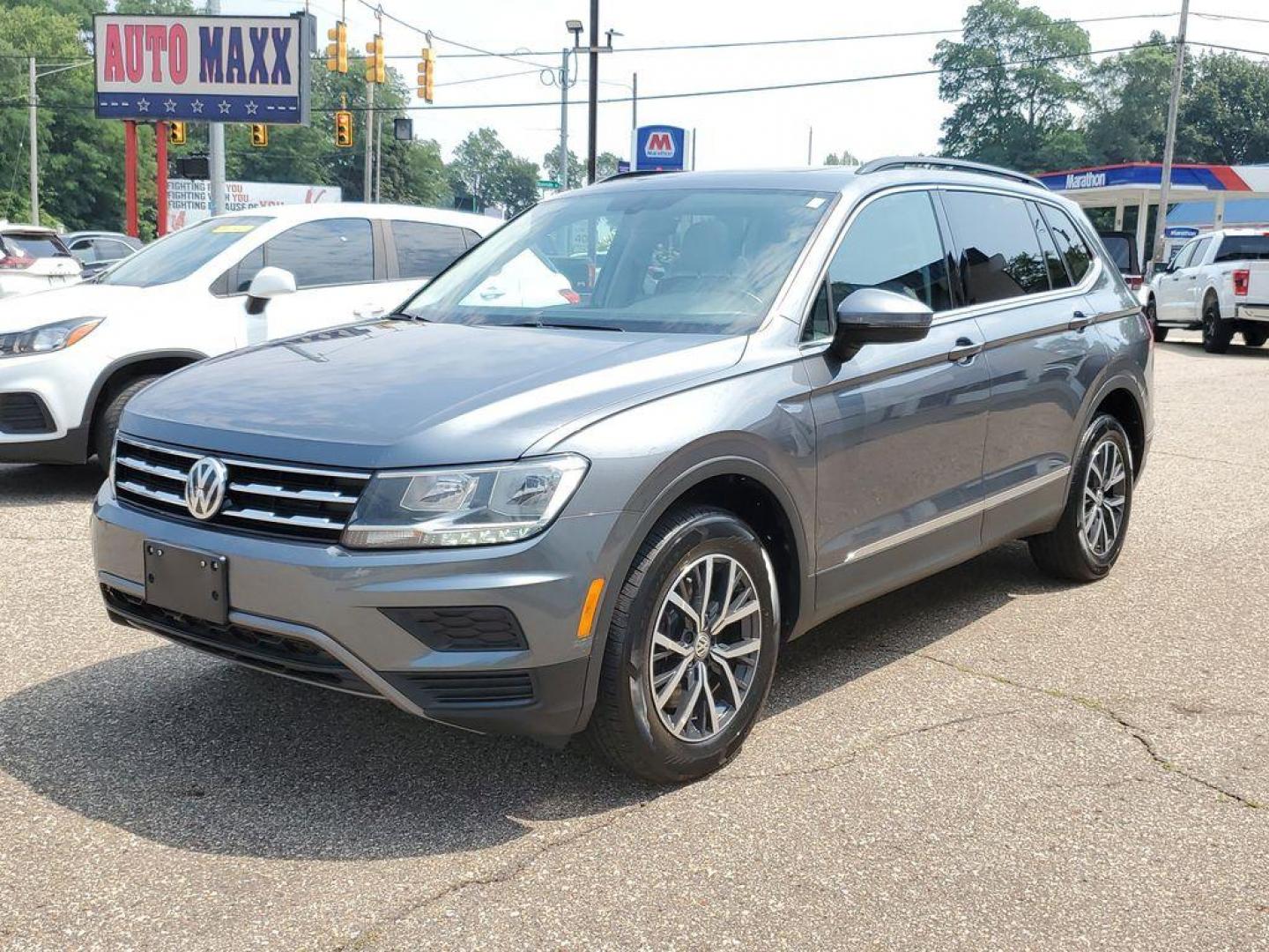 2020 Platinum Gray Metallic /Storm Gray Volkswagen Tiguan SEL (3VV3B7AX0LM) with an 2.0L L4 DOHC 16V TURBO engine, 8A transmission, located at 234 Columbia Ave, Battle Creek, MI, 49015, (269) 222-0088, 42.298264, -85.192543 - Get ready to elevate your driving experience with this exceptional 2020 Volkswagen Tiguan! This sleek and stylish SUV is perfect for those who crave a blend of performance, comfort, and technology. Powered by a robust 4-cylinder, 2.0L engine, this Volkswagen Tiguan delivers impressive efficiency and - Photo#1