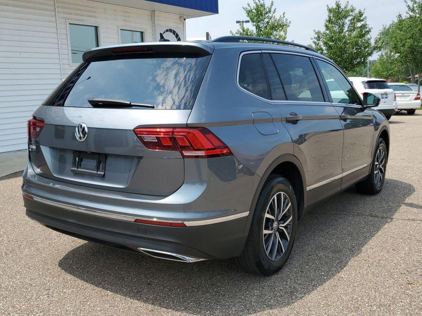 2020 Platinum Gray Metallic /Storm Gray Volkswagen Tiguan SEL (3VV3B7AX0LM) with an 2.0L L4 DOHC 16V TURBO engine, 8A transmission, located at 234 Columbia Ave, Battle Creek, MI, 49015, (269) 222-0088, 42.298264, -85.192543 - Get ready to elevate your driving experience with this exceptional 2020 Volkswagen Tiguan! This sleek and stylish SUV is perfect for those who crave a blend of performance, comfort, and technology. Powered by a robust 4-cylinder, 2.0L engine, this Volkswagen Tiguan delivers impressive efficiency and - Photo#3