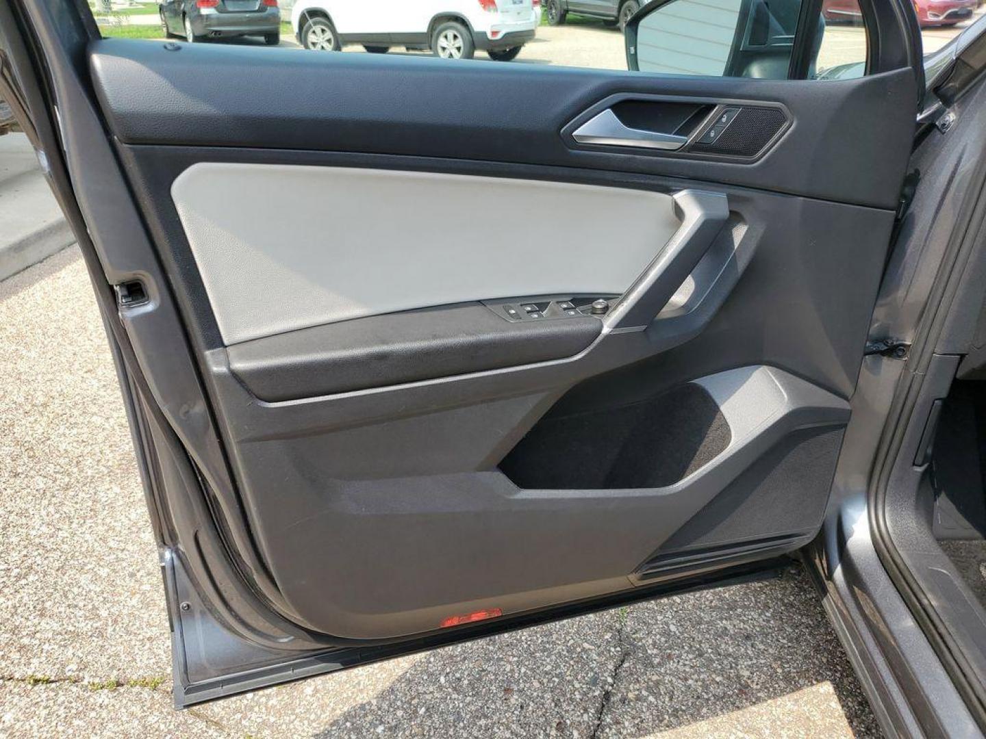 2020 Platinum Gray Metallic /Storm Gray Volkswagen Tiguan SEL (3VV3B7AX0LM) with an 2.0L L4 DOHC 16V TURBO engine, 8A transmission, located at 234 Columbia Ave, Battle Creek, MI, 49015, (269) 222-0088, 42.298264, -85.192543 - Get ready to elevate your driving experience with this exceptional 2020 Volkswagen Tiguan! This sleek and stylish SUV is perfect for those who crave a blend of performance, comfort, and technology. Powered by a robust 4-cylinder, 2.0L engine, this Volkswagen Tiguan delivers impressive efficiency and - Photo#5