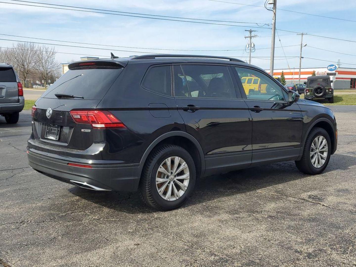 2020 Deep Black Pearl /Storm Gray Volkswagen Tiguan S 4Motion (3VV0B7AX6LM) with an 2.0L L4 DOHC 16V TURBO engine, 8A transmission, located at 6064 Gull Rd, Kalamazoo, MI, 49048, (269) 222-0088, 42.328388, -85.512924 - For sale: a 2020 Volkswagen Tiguan S 4Motion, a perfect blend of style, versatility, and reliability. This exceptional AWD SUV is powered by a robust 4-cylinder, 2.0L engine, offering a smooth and efficient driving experience. With a CARFAX Clean Report, this vehicle assures peace of mind and a hist - Photo#3