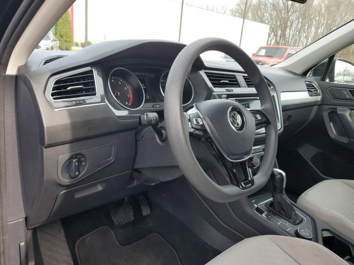 2020 Deep Black Pearl /Storm Gray Volkswagen Tiguan S 4Motion (3VV0B7AX6LM) with an 2.0L L4 DOHC 16V TURBO engine, 8A transmission, located at 6064 Gull Rd, Kalamazoo, MI, 49048, (269) 222-0088, 42.328388, -85.512924 - For sale: a 2020 Volkswagen Tiguan S 4Motion, a perfect blend of style, versatility, and reliability. This exceptional AWD SUV is powered by a robust 4-cylinder, 2.0L engine, offering a smooth and efficient driving experience. With a CARFAX Clean Report, this vehicle assures peace of mind and a hist - Photo#12