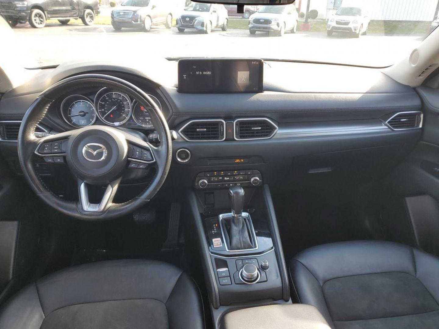 2021 Deep Crystal Blue Mica /Black Mazda CX-5 Touring (JM3KFACM6M0) with an 2.5L L4 DOHC 16V engine, 6A transmission, located at 234 Columbia Ave, Battle Creek, MI, 49015, (269) 222-0088, 42.298264, -85.192543 - <b>Vehicle Details</b><br>Experience the perfect blend of style, performance, and comfort with this pristine 2021 Mazda CX-5 Touring! With an impressive 0 miles on the odometer, this vehicle is practically brand new and ready to hit the road with you. The sleek design and dynamic curves of the Mazda - Photo#7