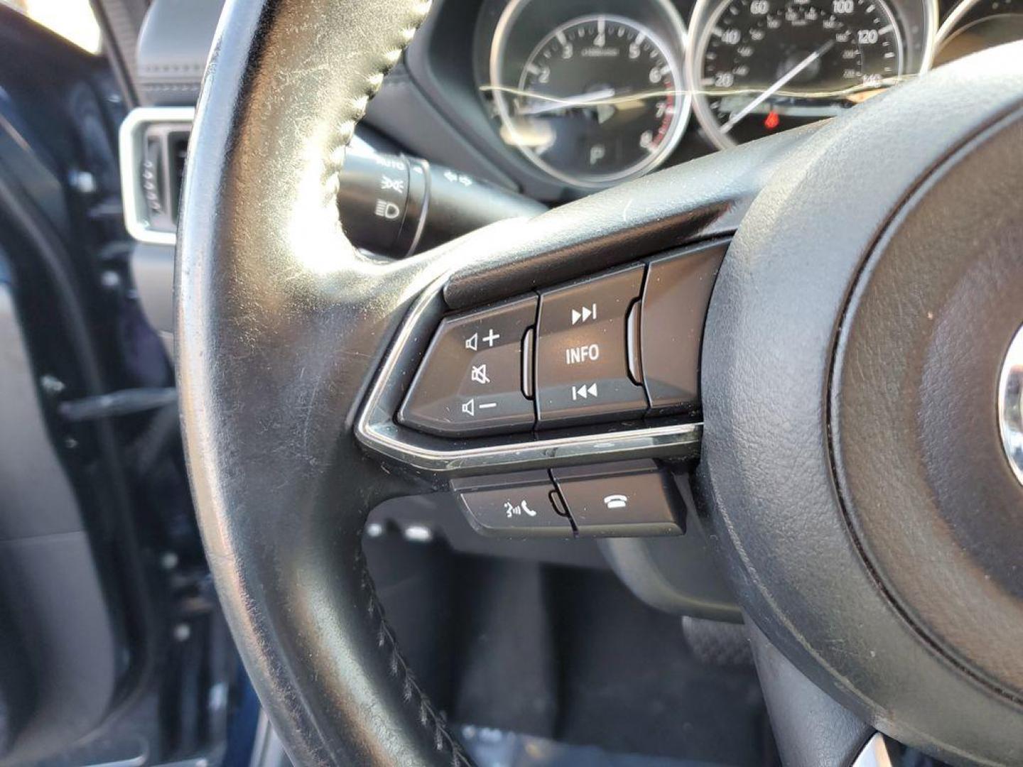 2021 Deep Crystal Blue Mica /Black Mazda CX-5 Touring (JM3KFACM6M0) with an 2.5L L4 DOHC 16V engine, 6A transmission, located at 234 Columbia Ave, Battle Creek, MI, 49015, (269) 222-0088, 42.298264, -85.192543 - <b>Vehicle Details</b><br>Experience the perfect blend of style, performance, and comfort with this pristine 2021 Mazda CX-5 Touring! With an impressive 0 miles on the odometer, this vehicle is practically brand new and ready to hit the road with you. The sleek design and dynamic curves of the Mazda - Photo#14