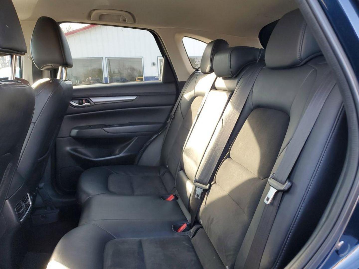 2021 Deep Crystal Blue Mica /Black Mazda CX-5 Touring (JM3KFACM6M0) with an 2.5L L4 DOHC 16V engine, 6A transmission, located at 234 Columbia Ave, Battle Creek, MI, 49015, (269) 222-0088, 42.298264, -85.192543 - <b>Vehicle Details</b><br>Experience the perfect blend of style, performance, and comfort with this pristine 2021 Mazda CX-5 Touring! With an impressive 0 miles on the odometer, this vehicle is practically brand new and ready to hit the road with you. The sleek design and dynamic curves of the Mazda - Photo#6