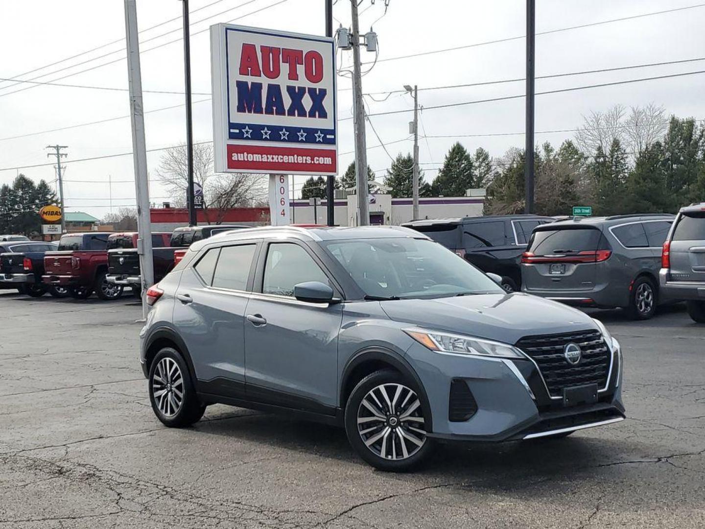 2021 Boulder Gray Pearl /Charcoal Nissan Kicks SV (3N1CP5CV2ML) with an 1.6L L4 engine, CVT transmission, located at 6064 Gull Rd, Kalamazoo, MI, 49048, (269) 222-0088, 42.328388, -85.512924 - <b>Vehicle Details</b><br>For those seeking a versatile and efficient vehicle, consider this 2021 Nissan Kicks SV, a perfect blend of style and practicality. This compact SUV features a 4-cylinder, 1.6L engine, offering a smooth ride with impressive fuel efficiency. With front-wheel drive, its desig - Photo#0