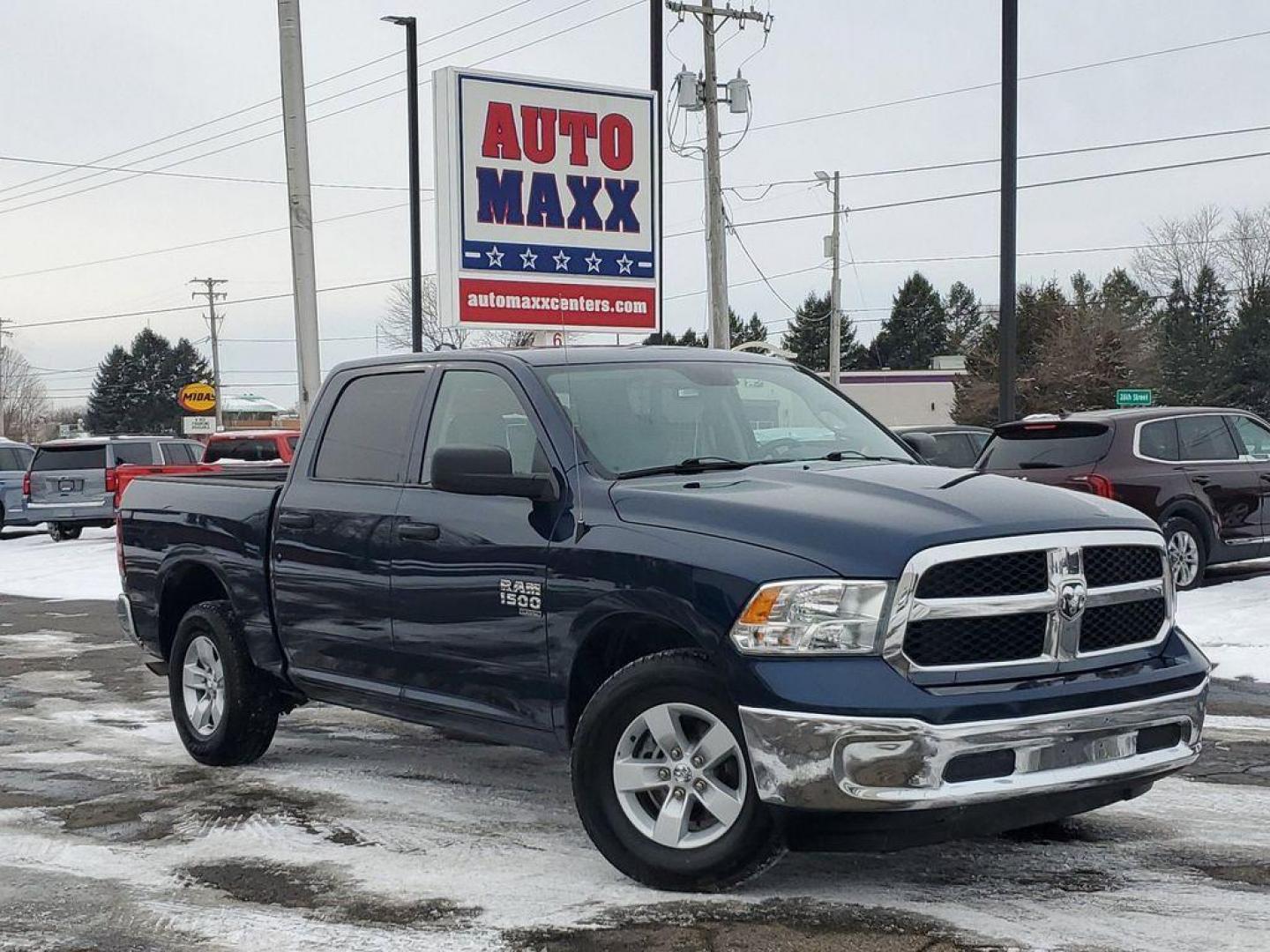 2022 Patriot Blue Pearlcoat /Diesel Gray/Black RAM 1500 Classic Tradesman Crew Cab SWB 4WD (1C6RR7LG2NS) with an 3.6L V6 DOHC 24V FFV engine, 8A transmission, located at 6064 Gull Rd, Kalamazoo, MI, 49048, (269) 222-0088, 42.328388, -85.512924 - Introducing the 2022 Ram 1500 Classic, a robust and reliable pickup that seamlessly blends power and performance. Perfect for any driving enthusiast, this truck is equipped with a 4WD system, ensuring remarkable off-road capabilities and superior handling in various terrains and weather conditions. - Photo#0