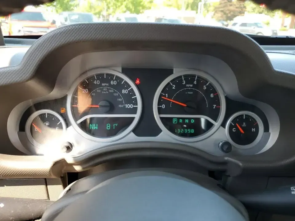 2010 Gray /Dark Khaki/Medium Khaki Jeep Wrangler Rubicon (1J4BA6D15AL) with an V6, 3.8L engine, 4-speed automatic transmission, located at 6064 Gull Rd, Kalamazoo, MI, 49048, (269) 222-0088, 42.328388, -85.512924 - Adventure awaits with our remarkable 2010 Jeep Wrangler Rubicon 4WD, a vehicle that embodies freedom and exploration. Whether you're looking to tackle rugged terrains on weekend getaways or navigate the urban jungle with style, this SUV is your perfect companion. With its iconic design and robust fe - Photo#13