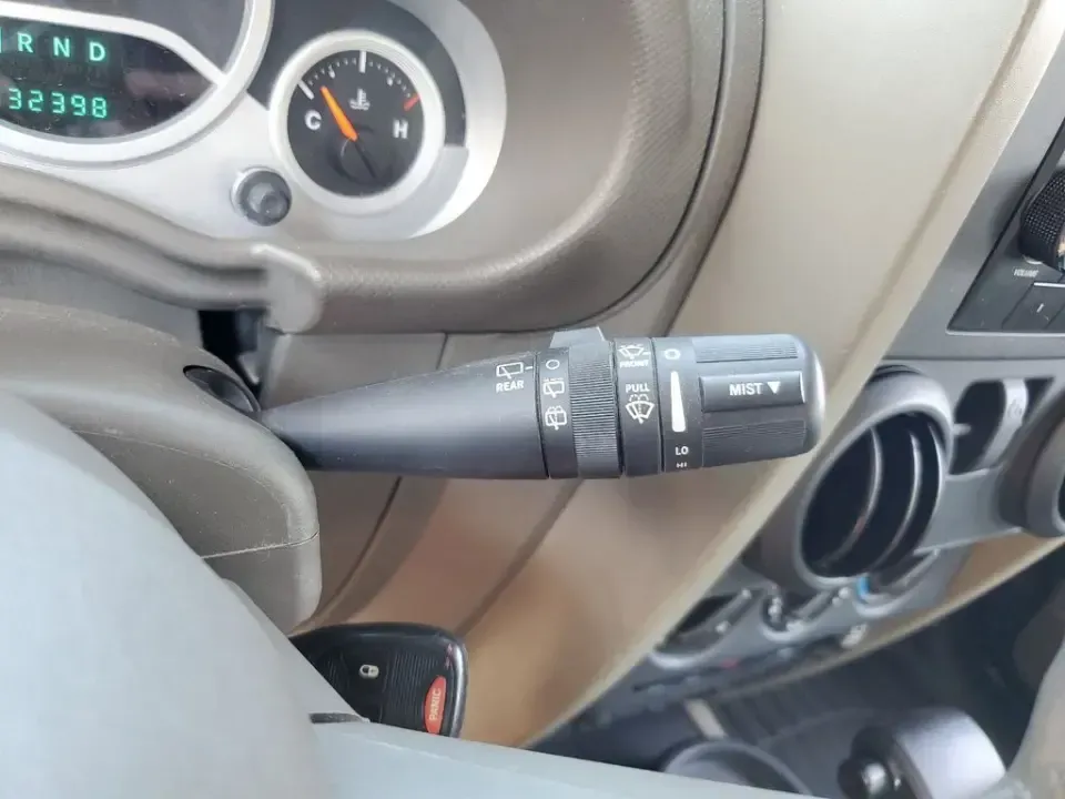 2010 Gray /Dark Khaki/Medium Khaki Jeep Wrangler Rubicon (1J4BA6D15AL) with an V6, 3.8L engine, 4-speed automatic transmission, located at 6064 Gull Rd, Kalamazoo, MI, 49048, (269) 222-0088, 42.328388, -85.512924 - Adventure awaits with our remarkable 2010 Jeep Wrangler Rubicon 4WD, a vehicle that embodies freedom and exploration. Whether you're looking to tackle rugged terrains on weekend getaways or navigate the urban jungle with style, this SUV is your perfect companion. With its iconic design and robust fe - Photo#15